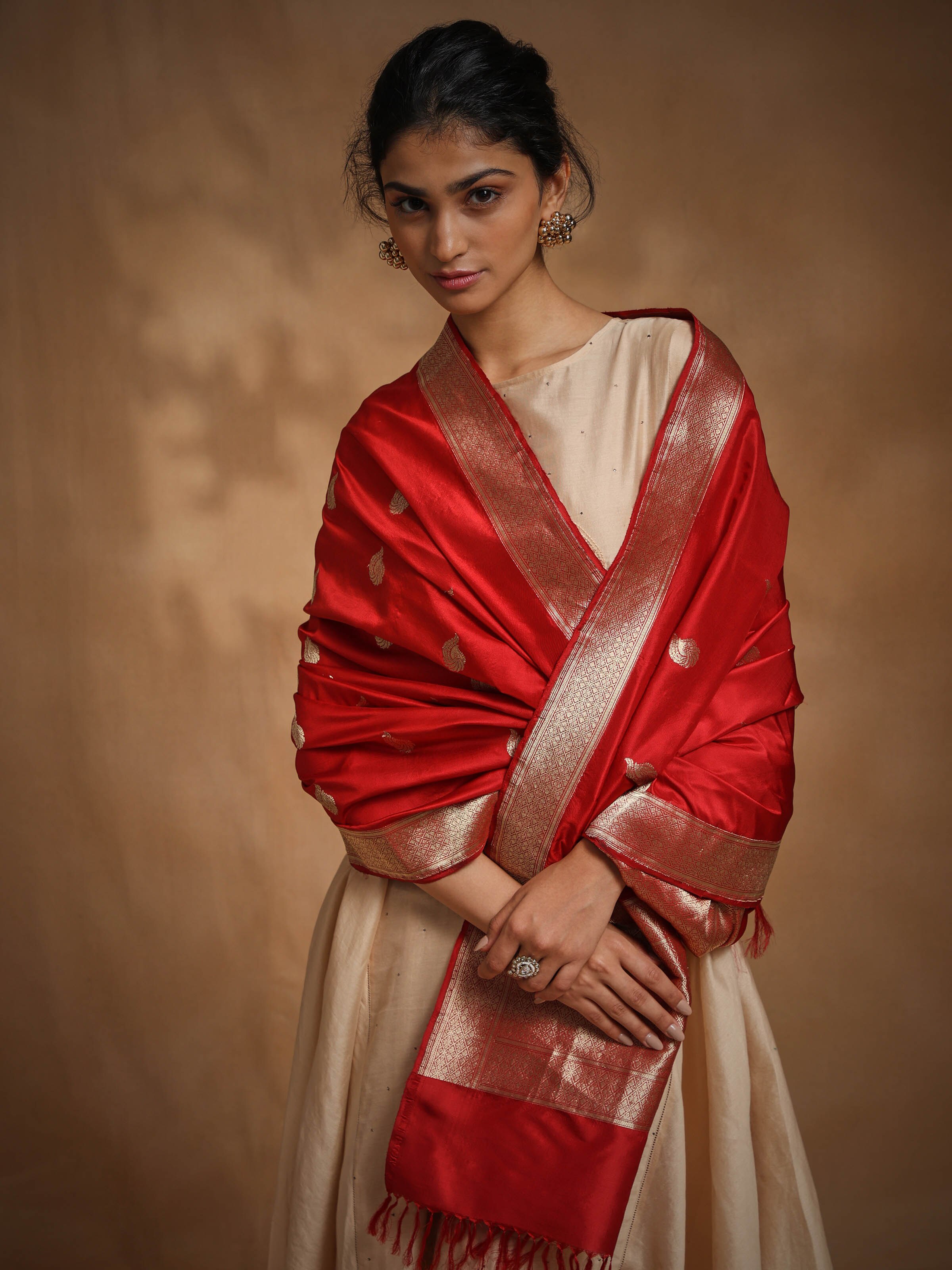 Side view of red Banarasi silk kadwa handwoven dupatta highlighting pattern details
