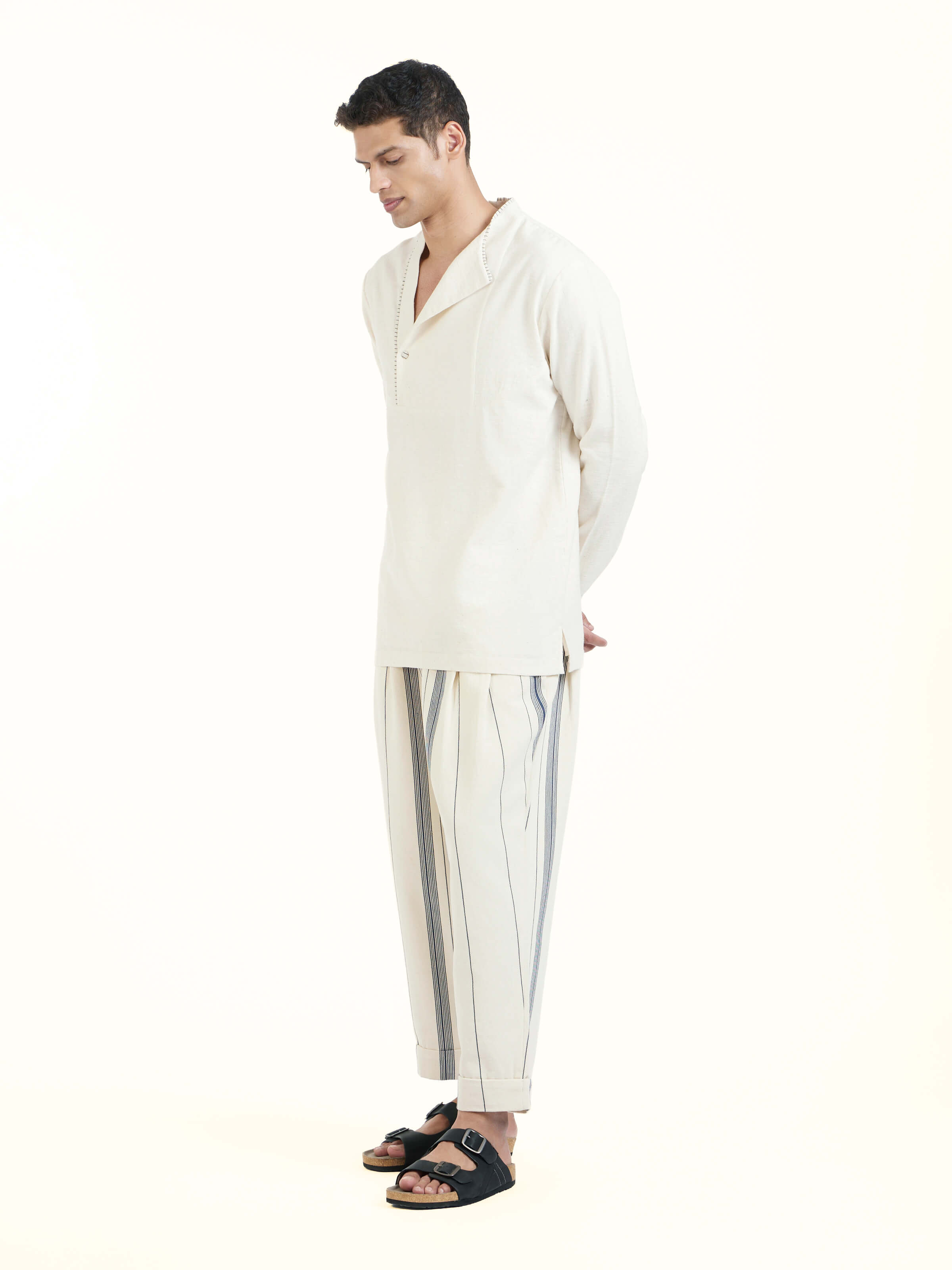 Side view of ivory cotton handloom short kurta showcasing relaxed fit