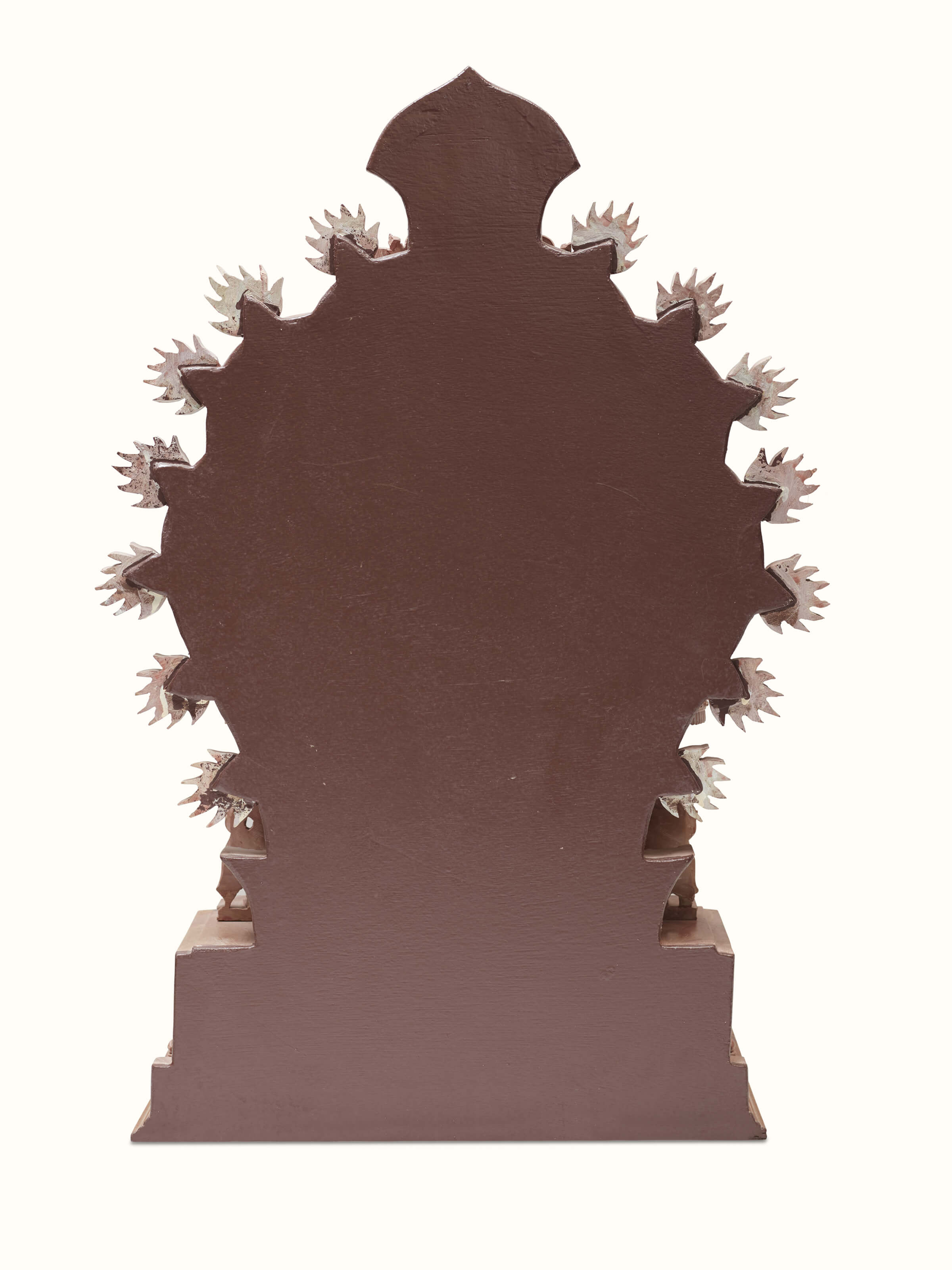 Detailed view of carved stone Vinayaka idol, showcasing the intricate carving patterns.