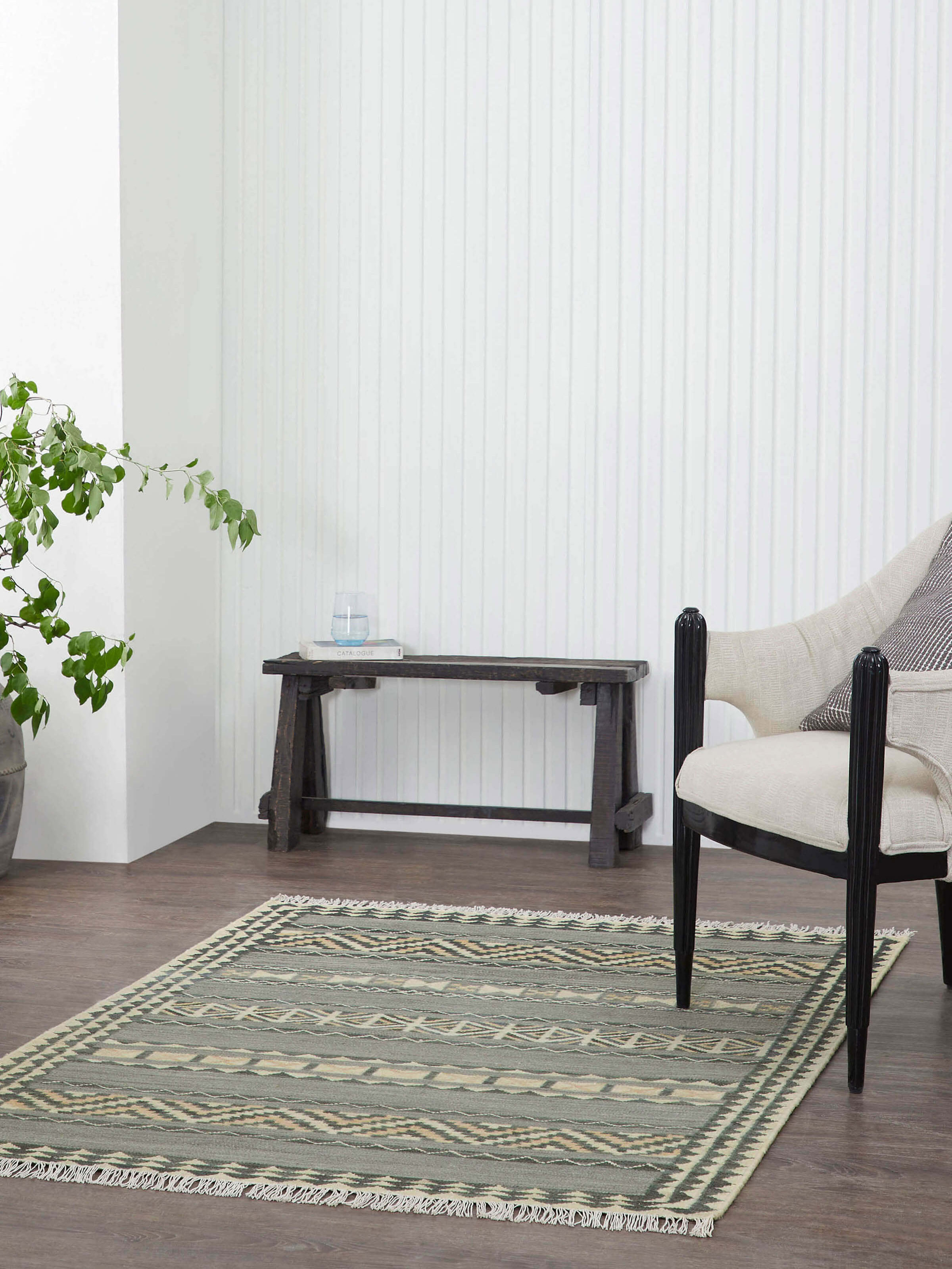 Top view highlighting the full layout and texture of the wool dhurrie