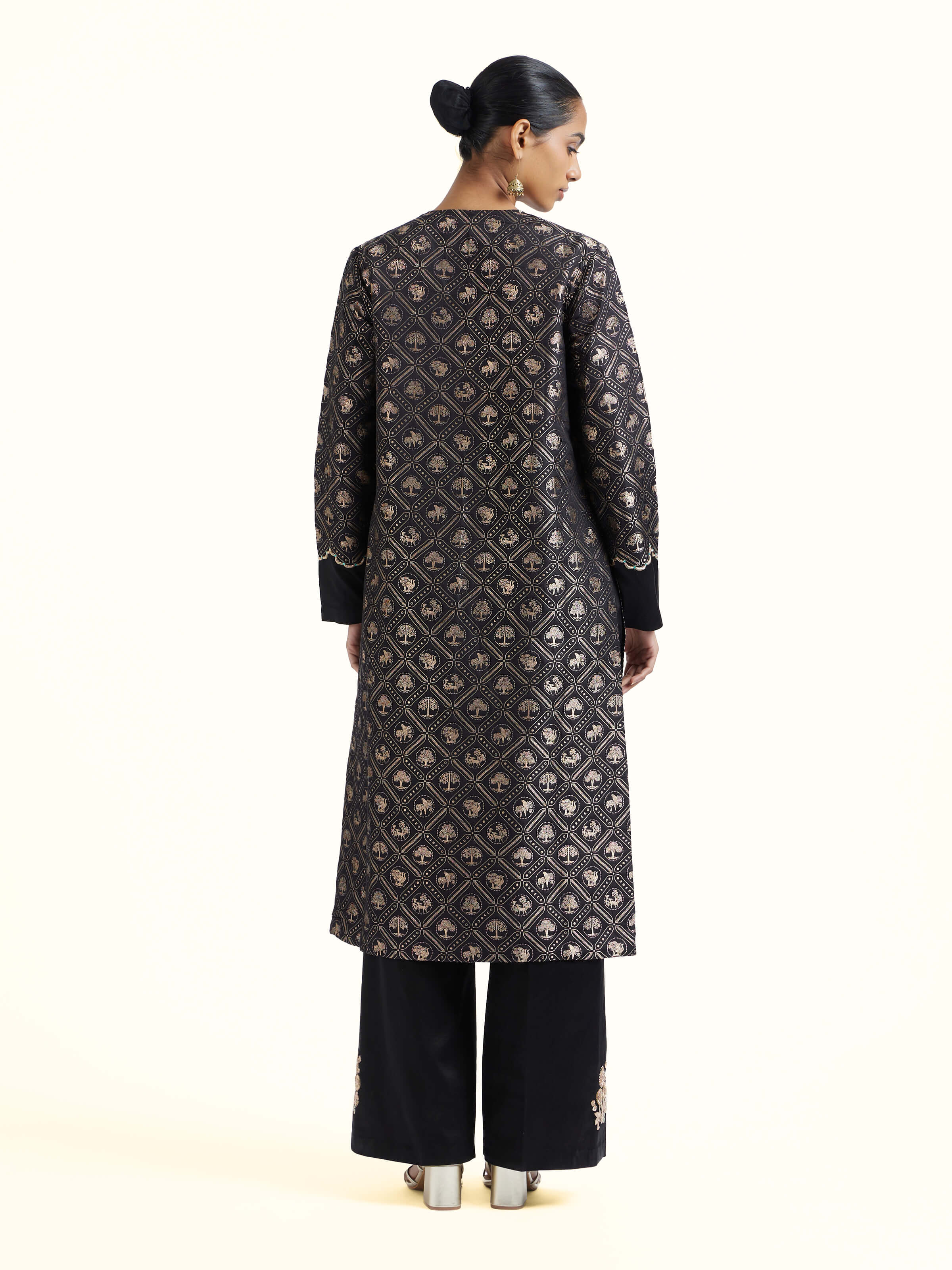 Back view of black silk Banarasi kurta set displaying complete ensemble