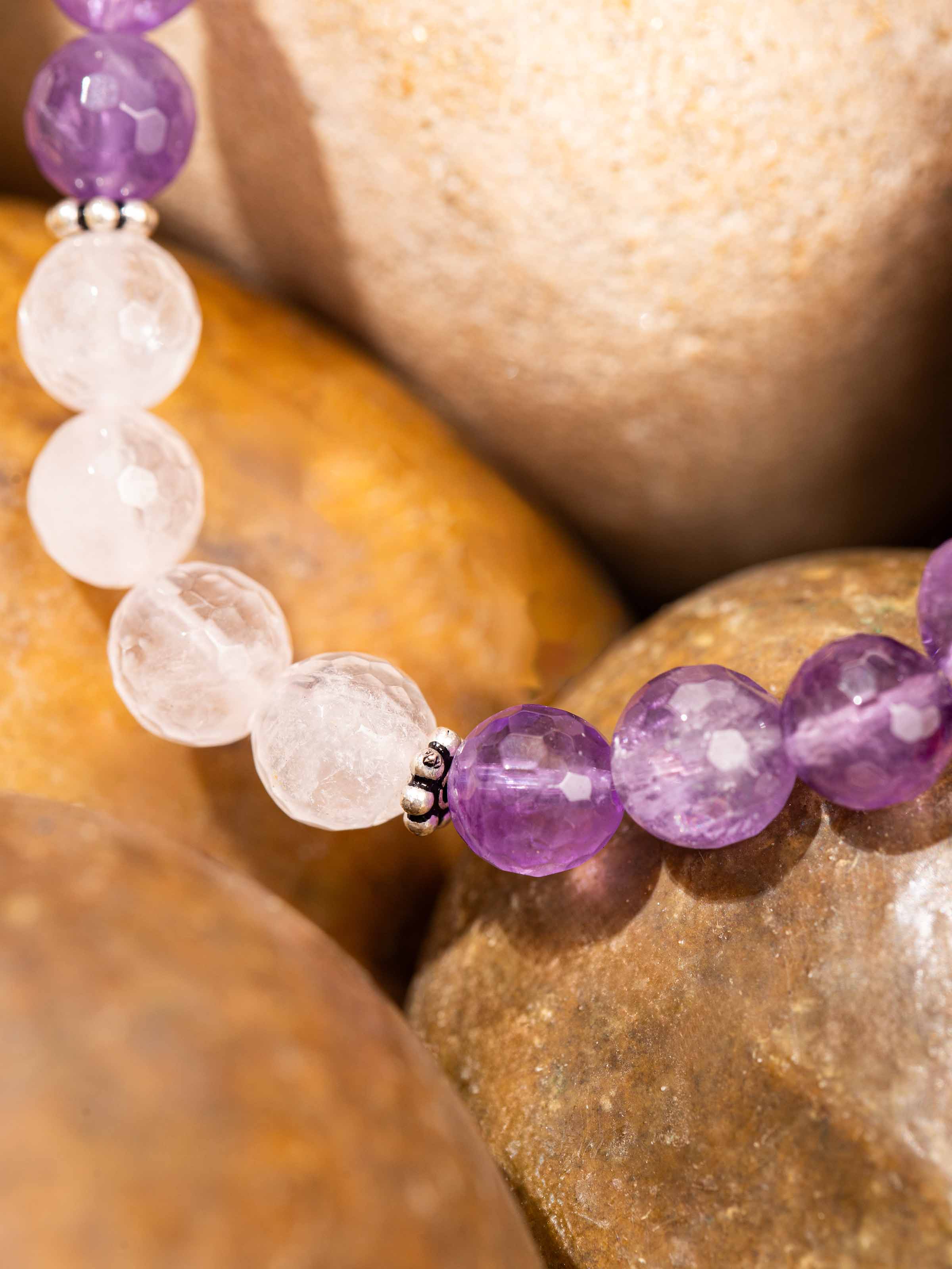 Side view of Amethyst & Rose Quartz Silver Bracelet showing the bracelet’s natural stone alignment and clasp design