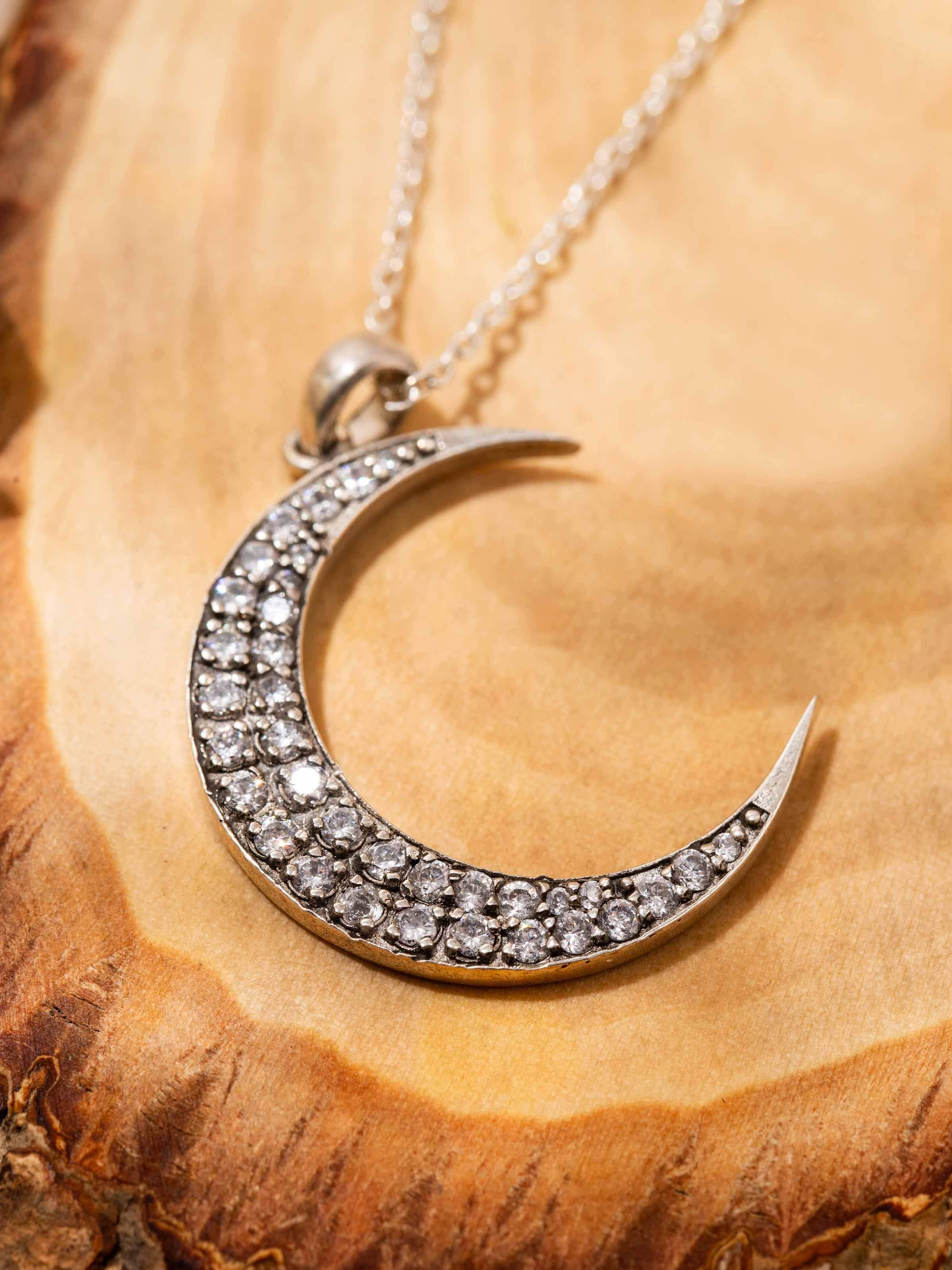 Detailed shot focusing on the texture and finishing of the pendant