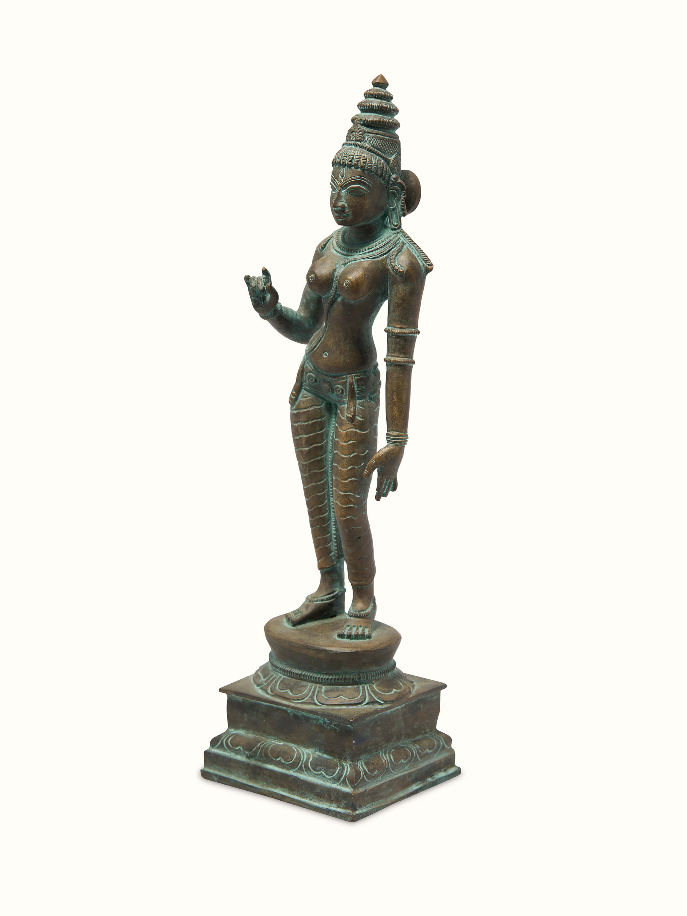 Angled view of Antique Bronze Casting Goddess Parvati Idol from Swadesh, emphasizing the delicate features and bronze texture.