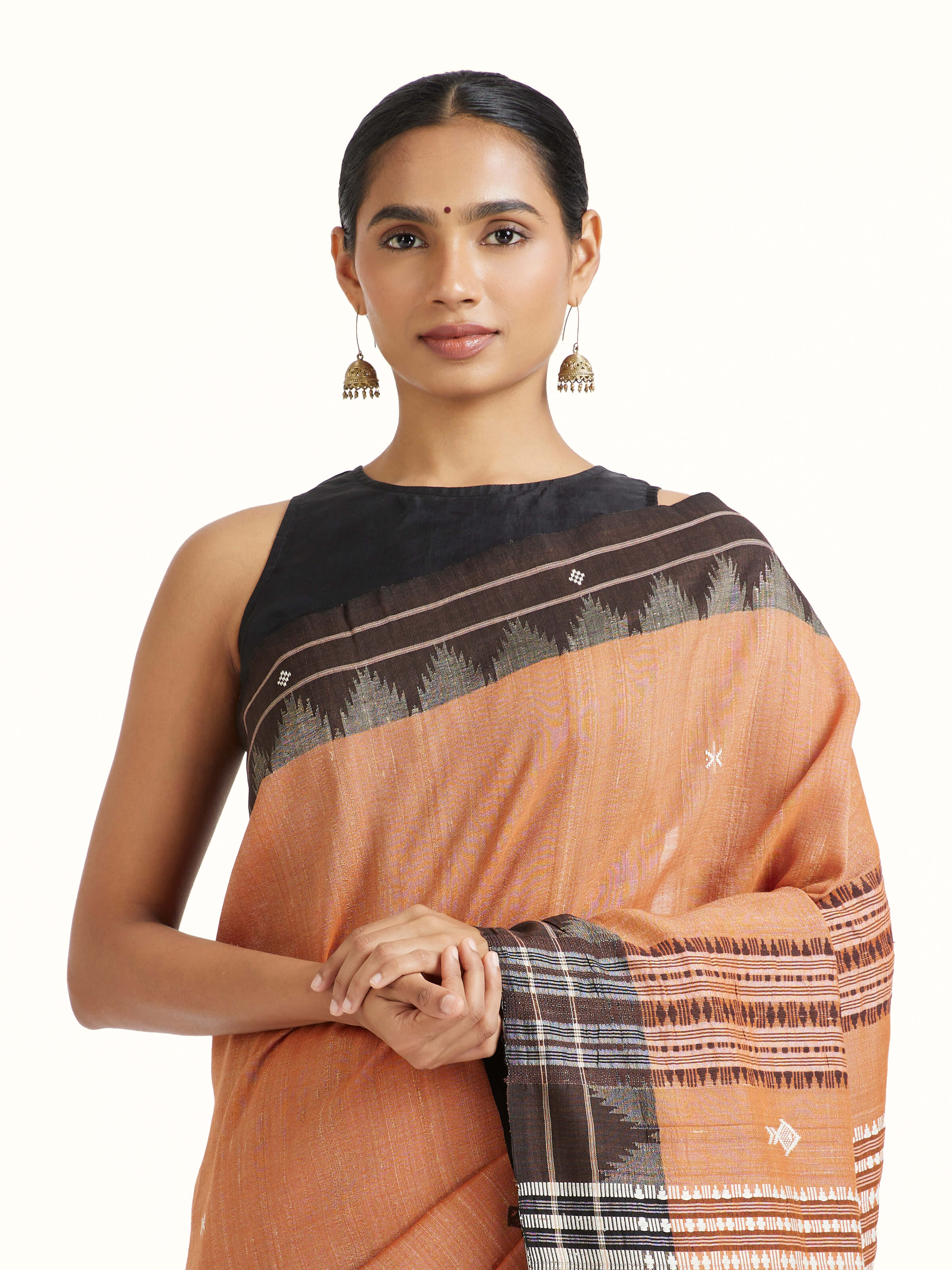 Angled view of Brown Cotton Tussar Silk Kotpad Saree revealing the depth of its color and intricate pattern