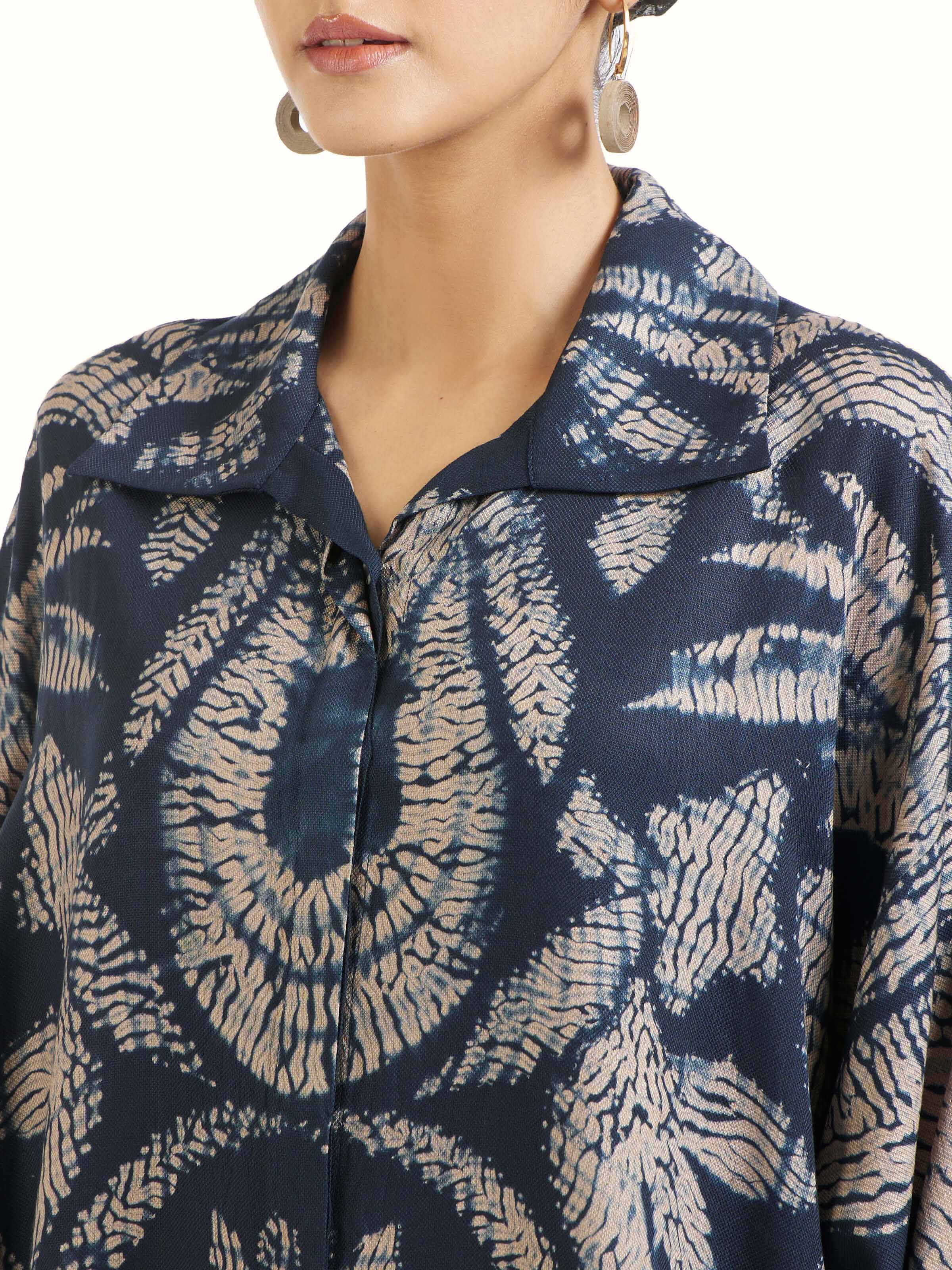 Detail view of blue modal shibori shirt showing shibori texture and modal softness
