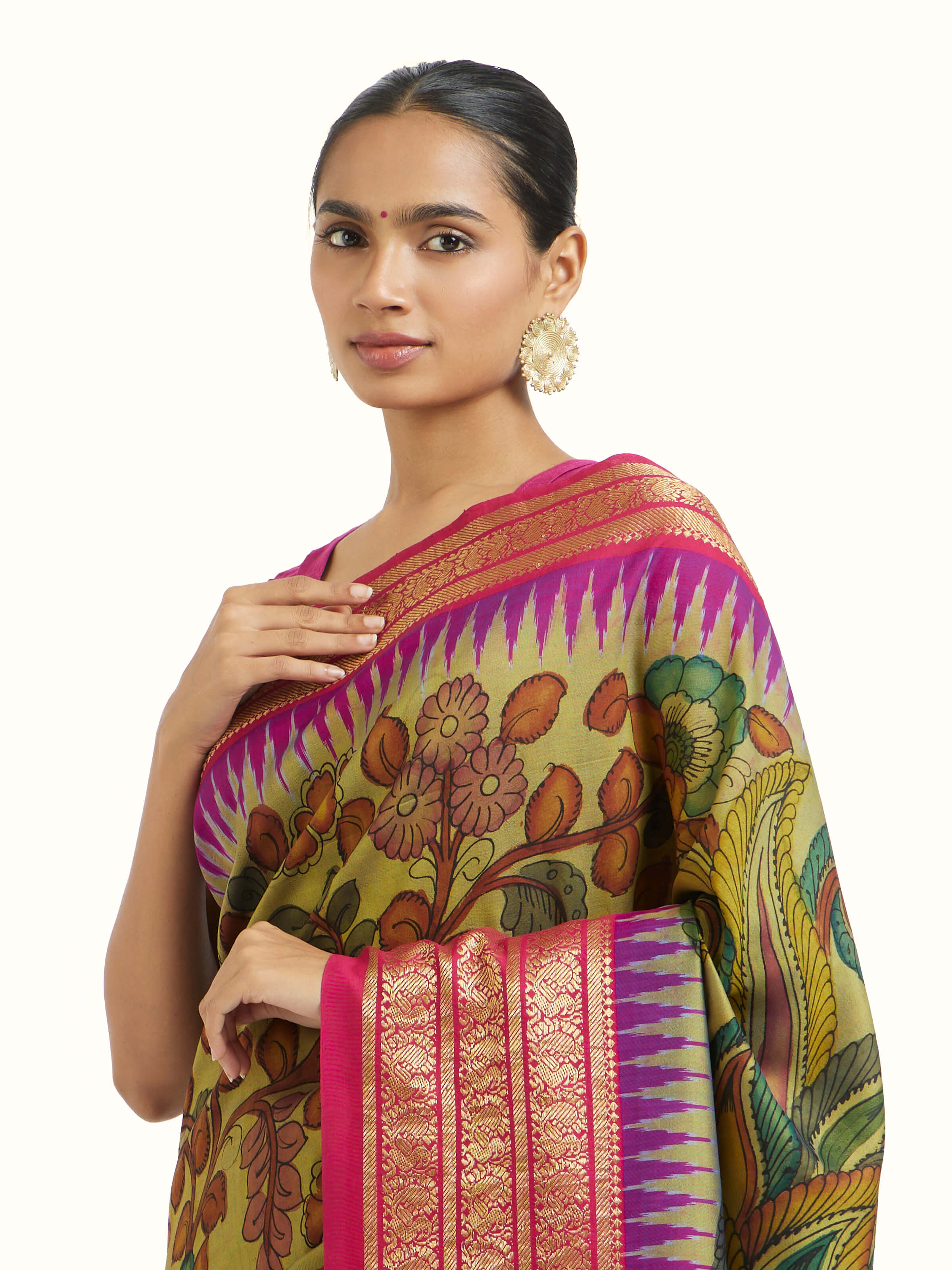 Angled view of silk Ikat Kalamkari saree highlighting Ikat weaving and Kalamkari design