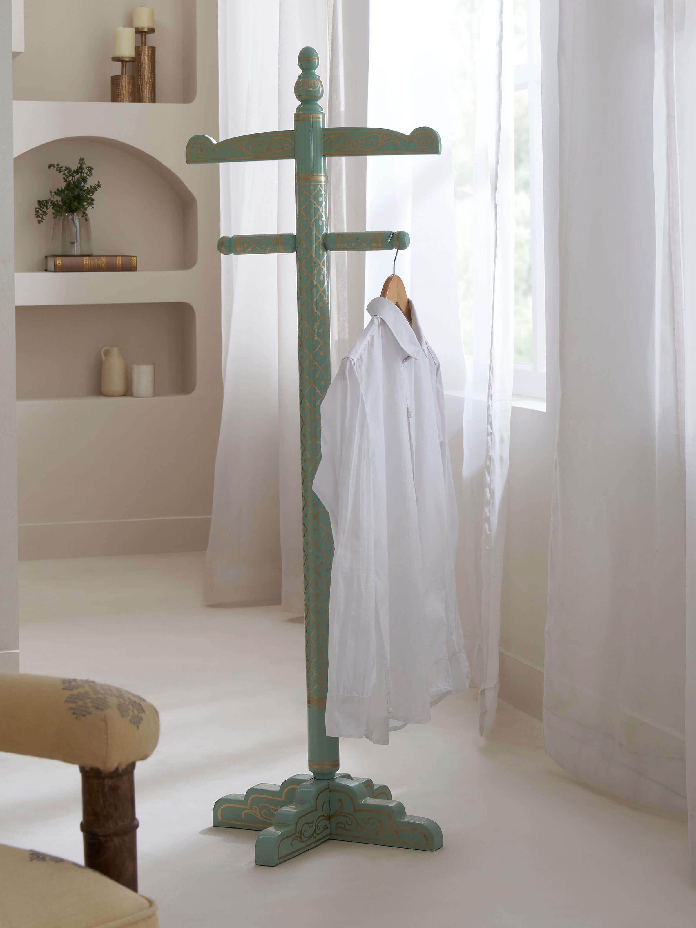 Teak Wood Sankheda Aqua Coat Hanger showcasing a stylish and functional design with intricate Sankheda woodwork and bright aqua finish.