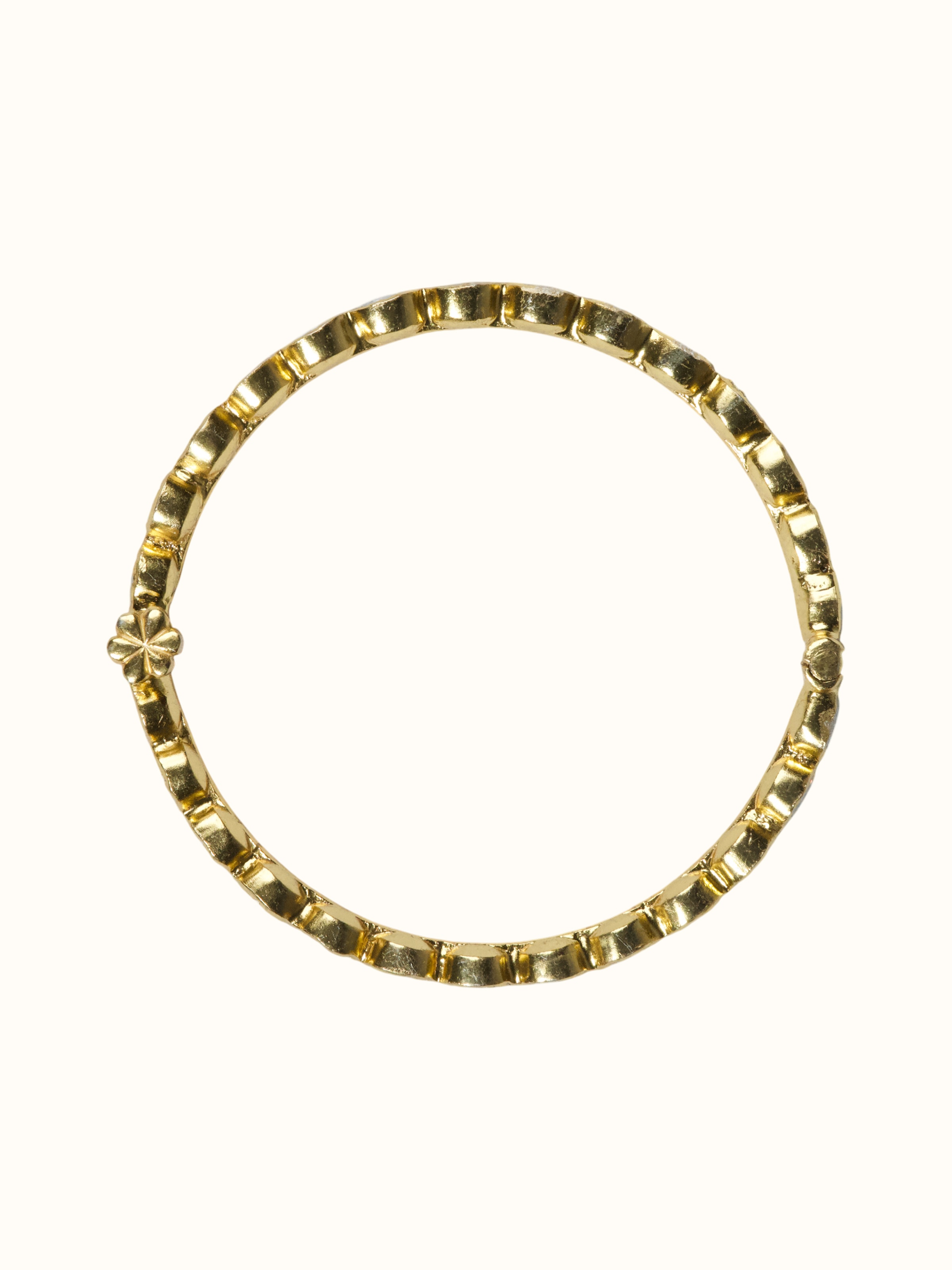 detail view of silver smithing multi-colour bangle pattern