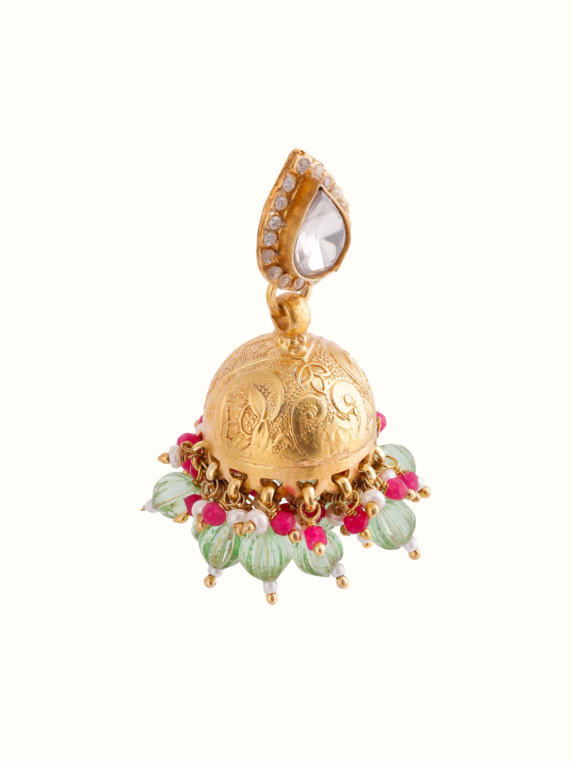 Artistic overhead view emphasizing design and shape of silver jhumkas