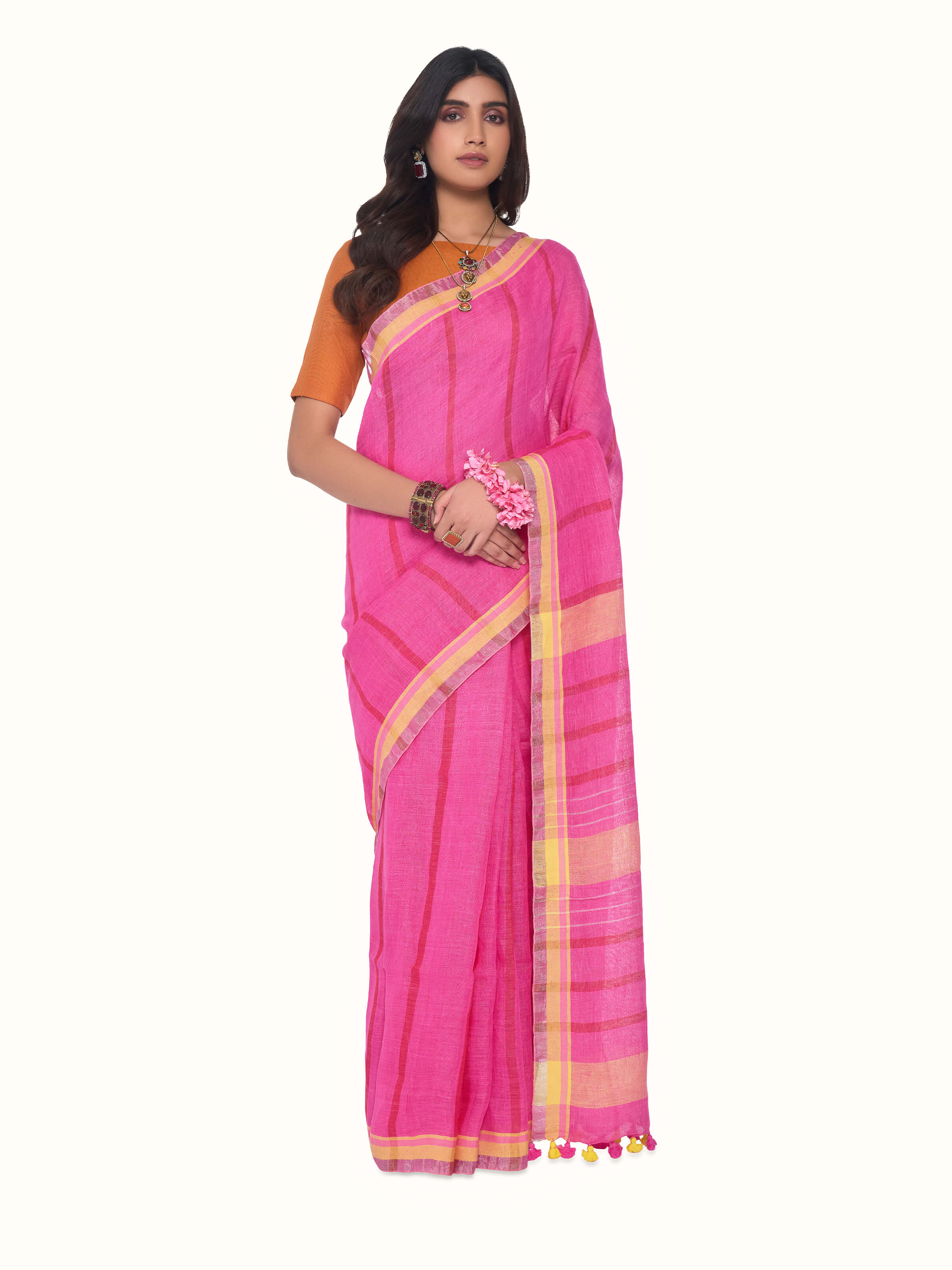 Front view of pink linen striped saree showcasing soft stripes and natural texture