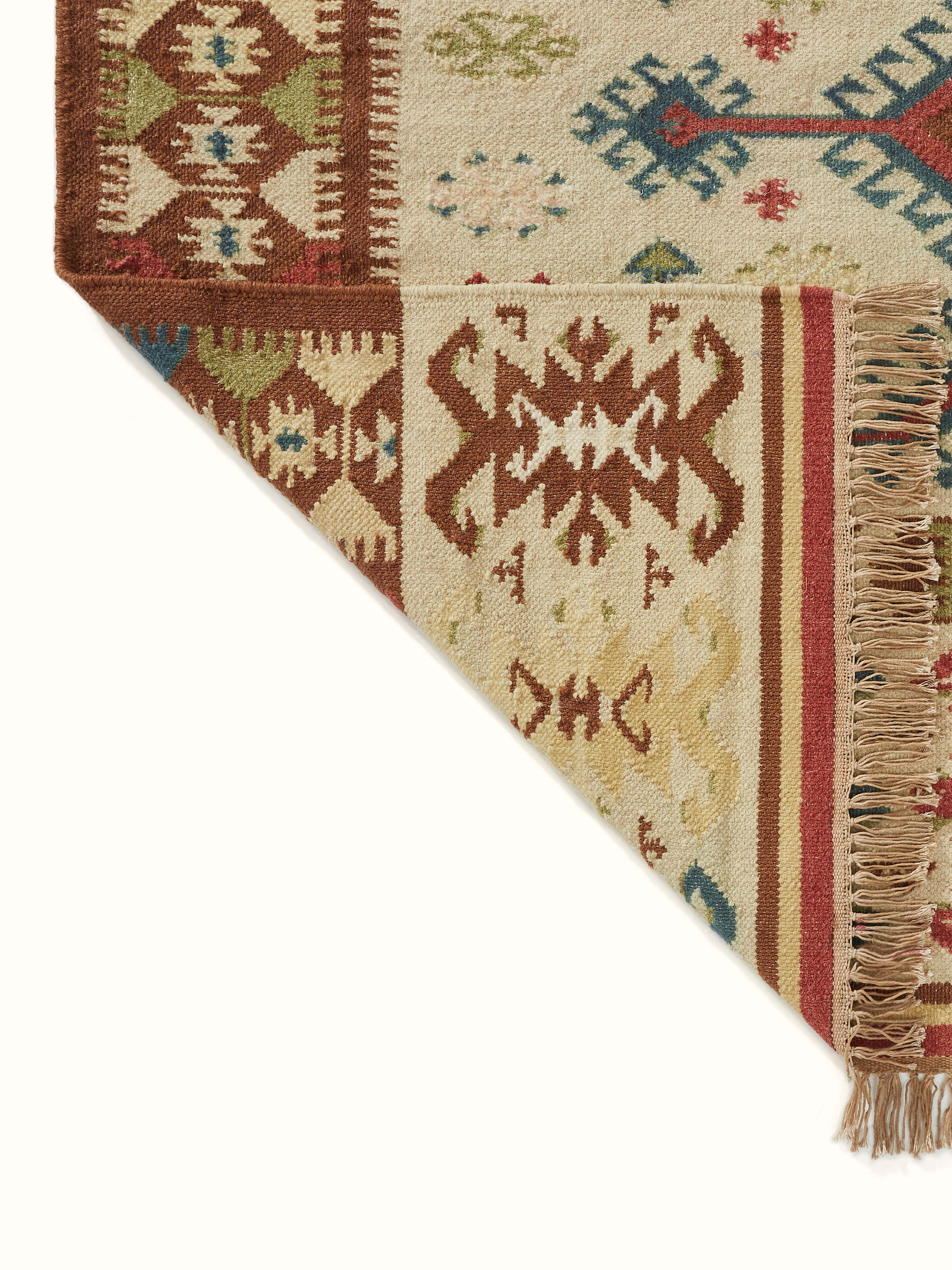 Side view of Traditional kilim beige salawas wool & cotton panja dhurrie, demonstrating its thickness and texture.