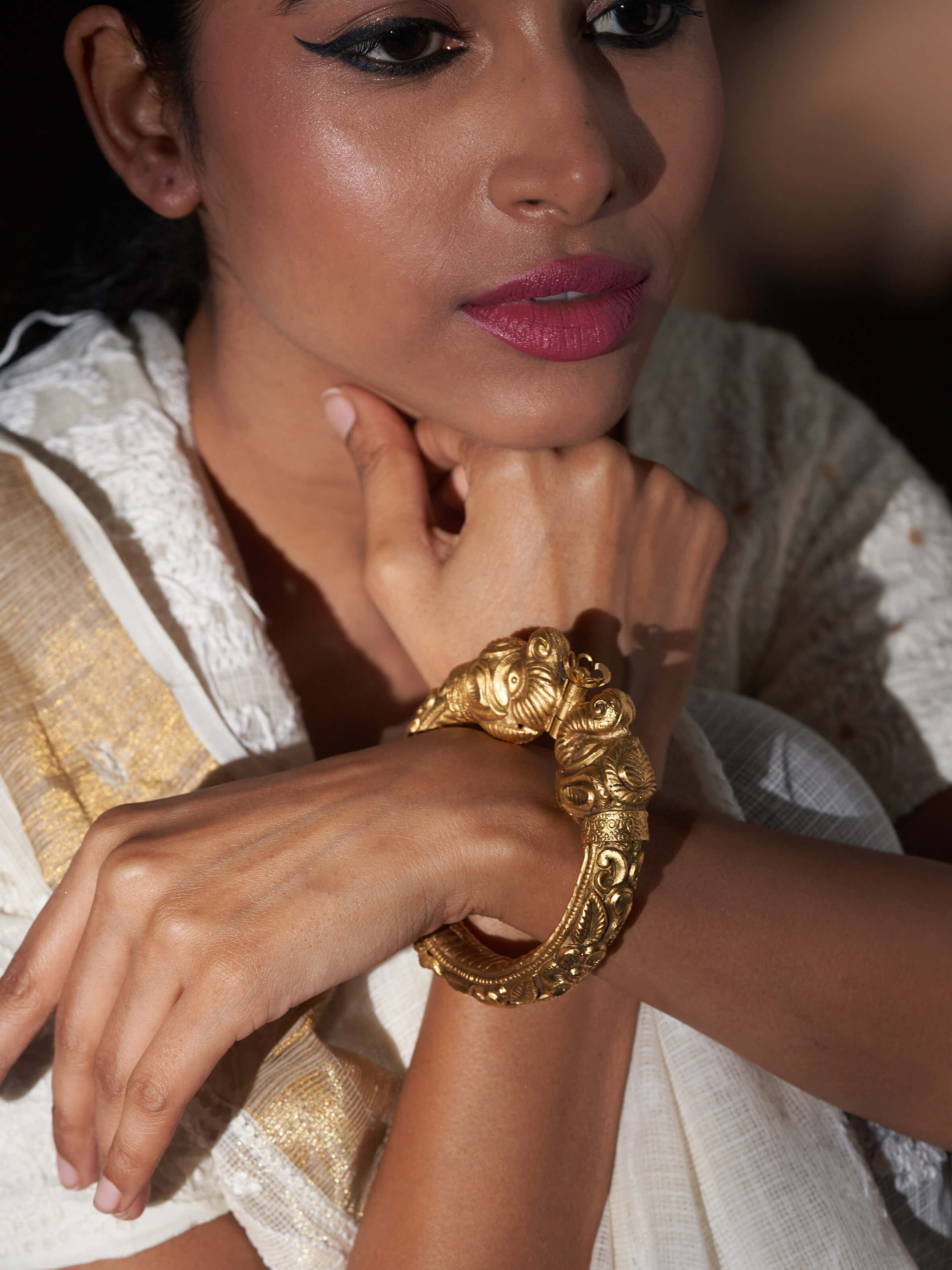 Close-up view of Silversmithing Kada highlighting detailed silver work and design.