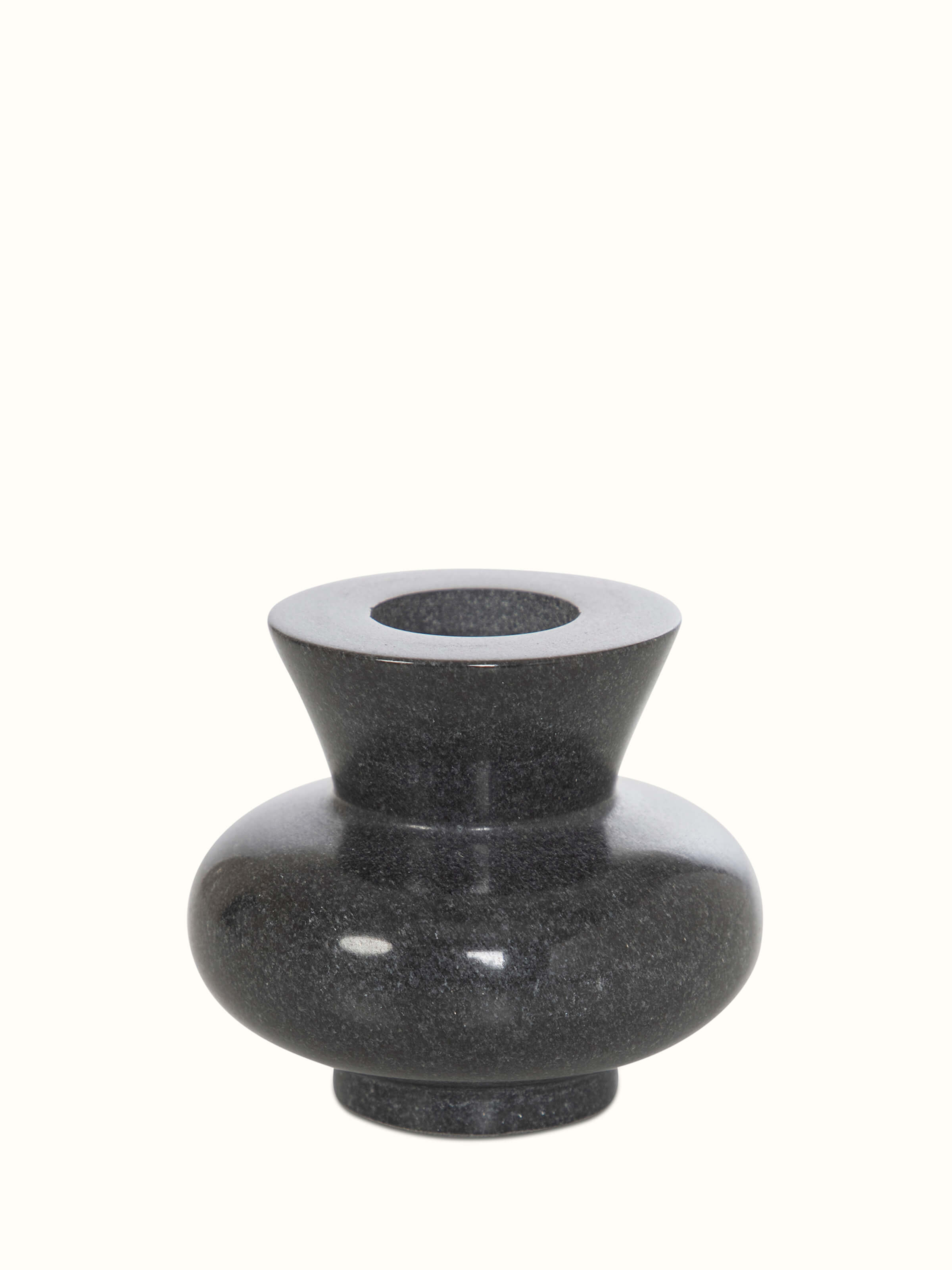 Front view of Carved marble tea light holder in black color showing elegant carving and smooth finish.