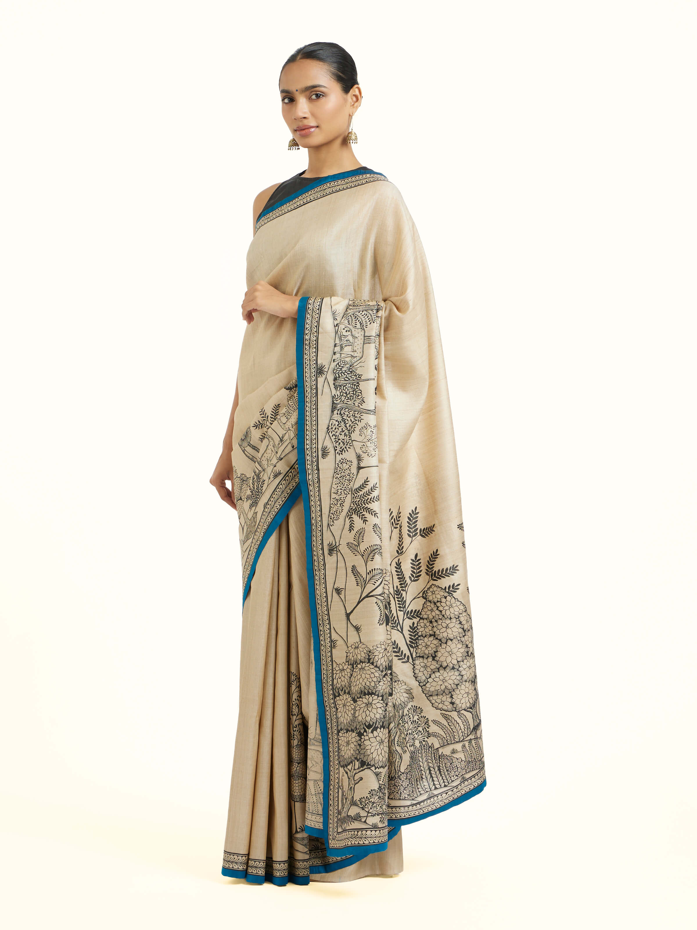 Side view of tussar silk Pattachitra saree highlighting soft silk drape