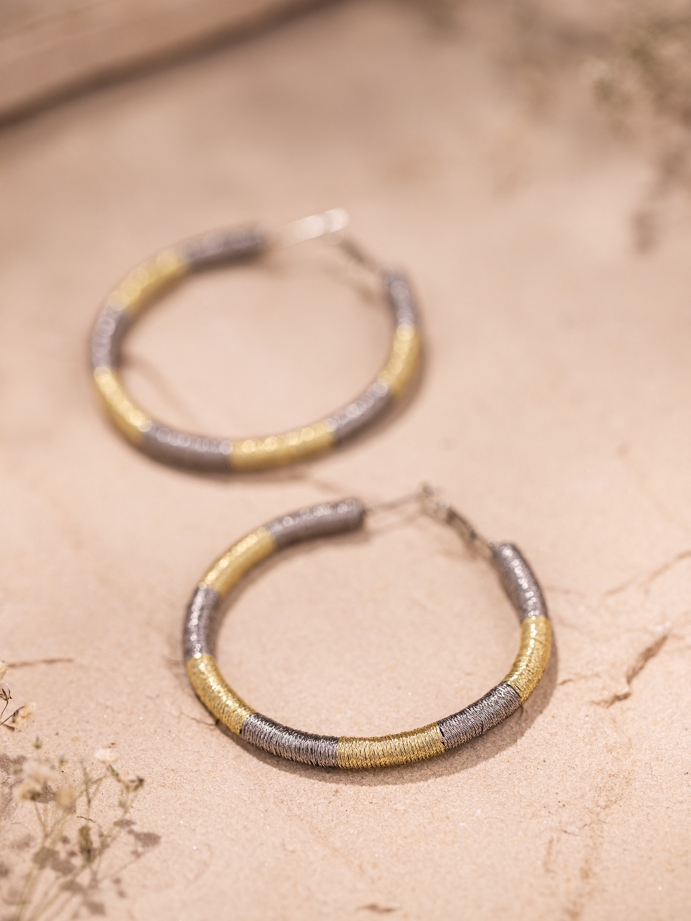 Detail shot of handcrafted hoop earrings