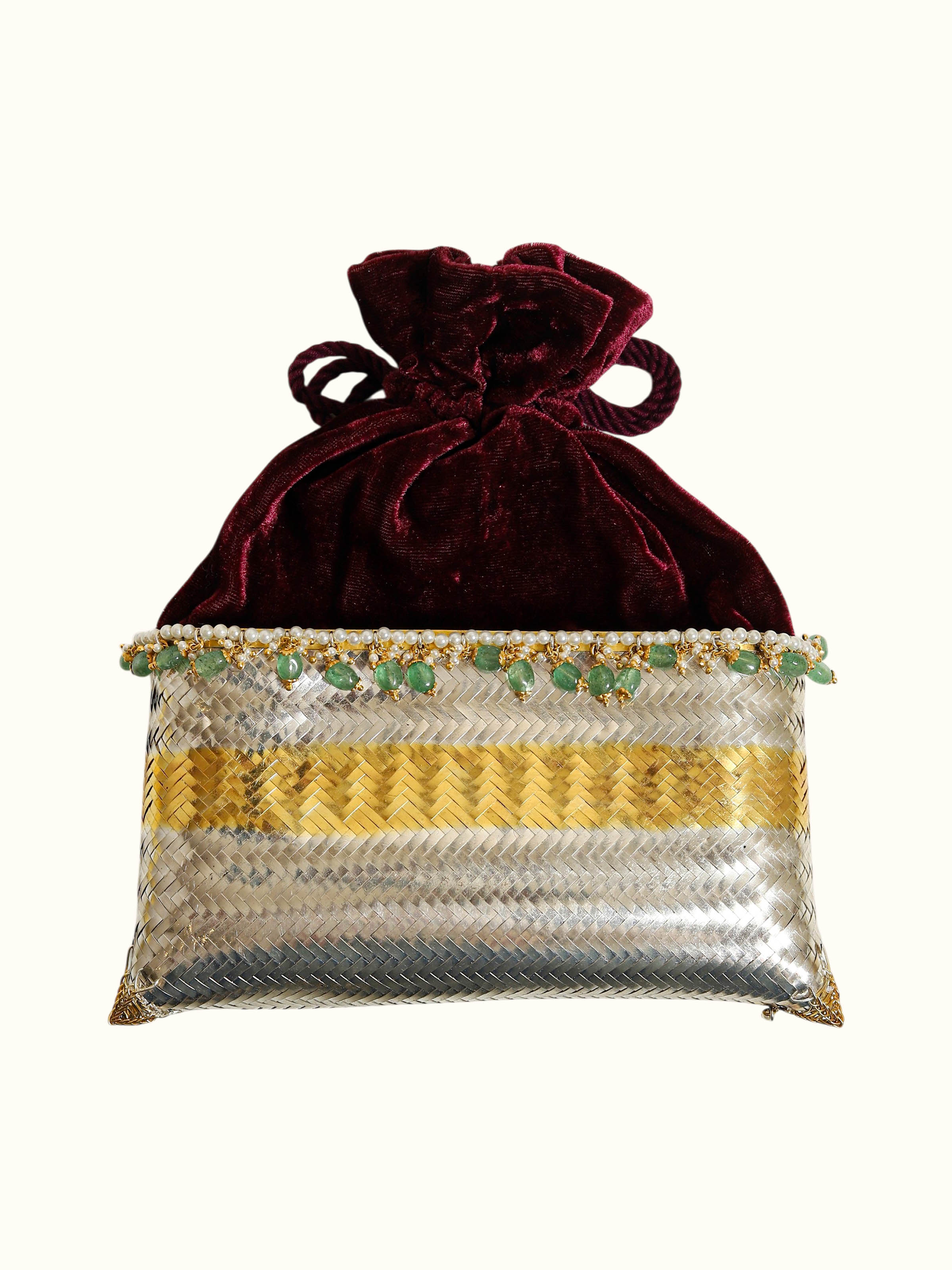 back view of silver smithing two-tone potli-style bag