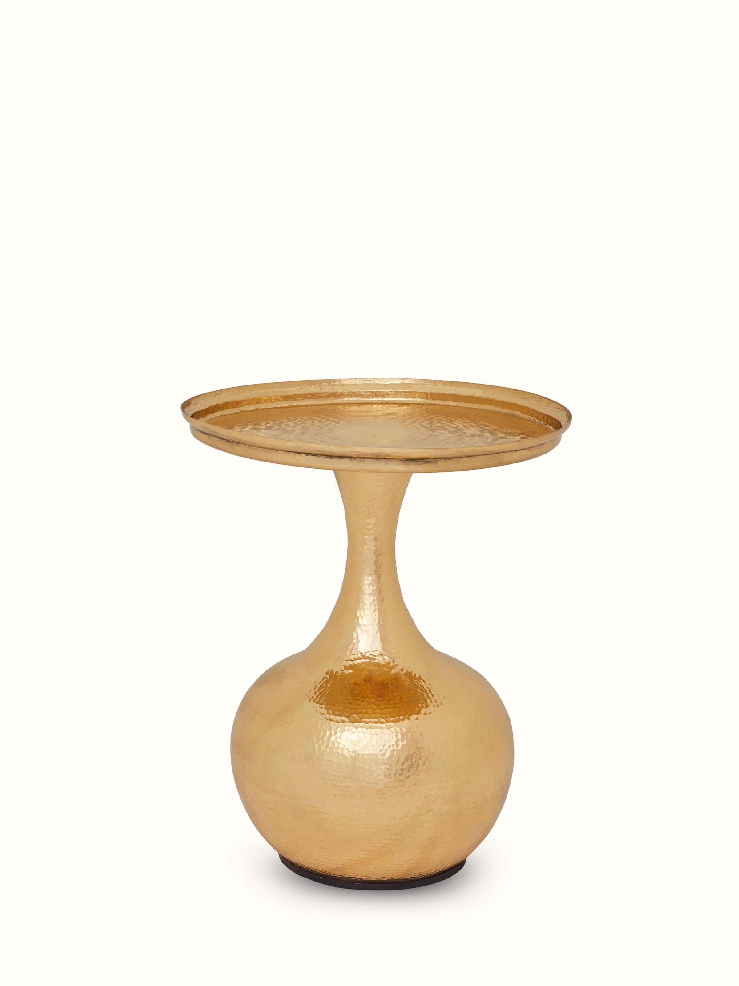 Side view of the Brass Thathera end and side table, emphasizing its refined design and brass inlay details.