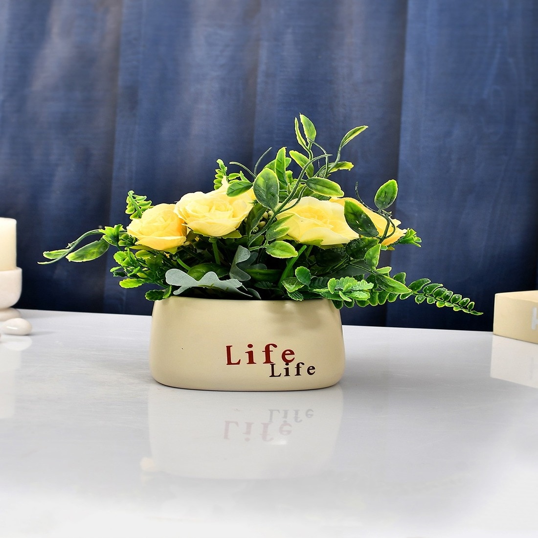 Yellow Artificial Flowers With A Modern Planter