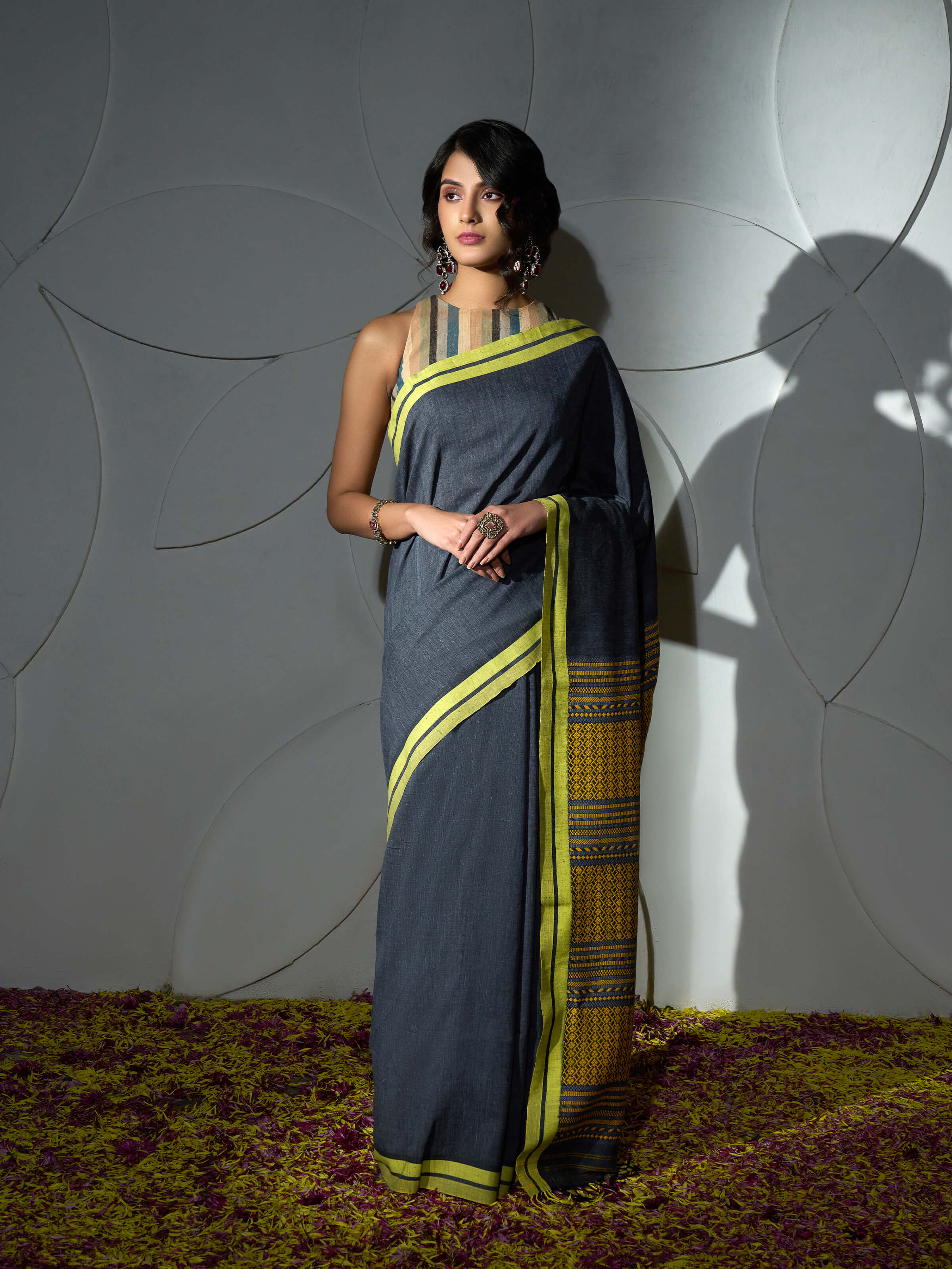 Side view of grey cotton silk saree with soft drape and lightweight fall