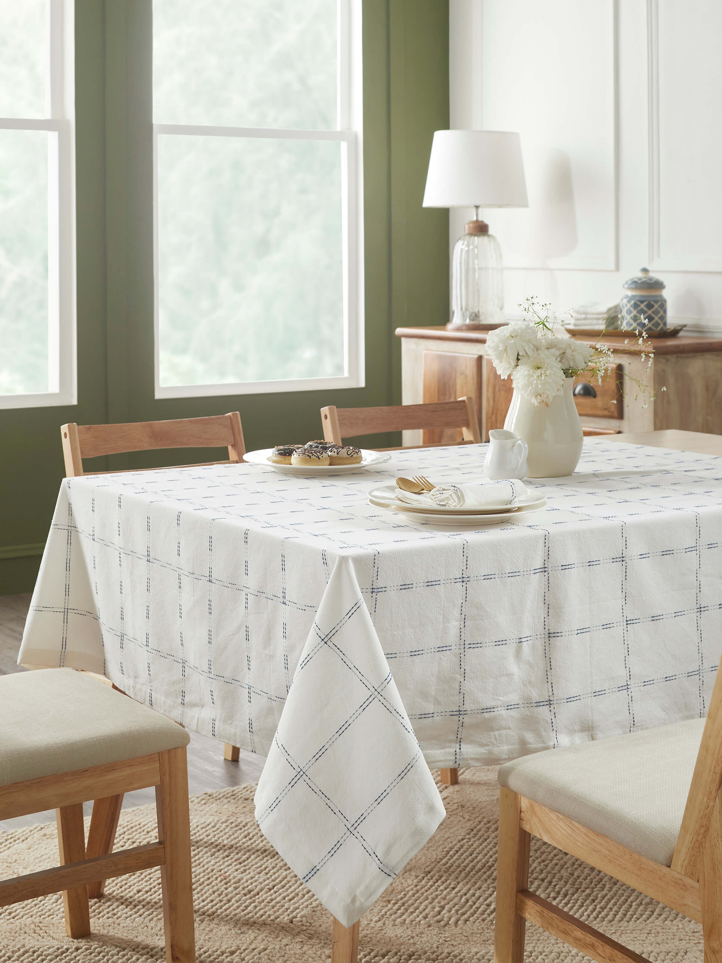 Lifestyle image showing the table cover in a styled dining setup