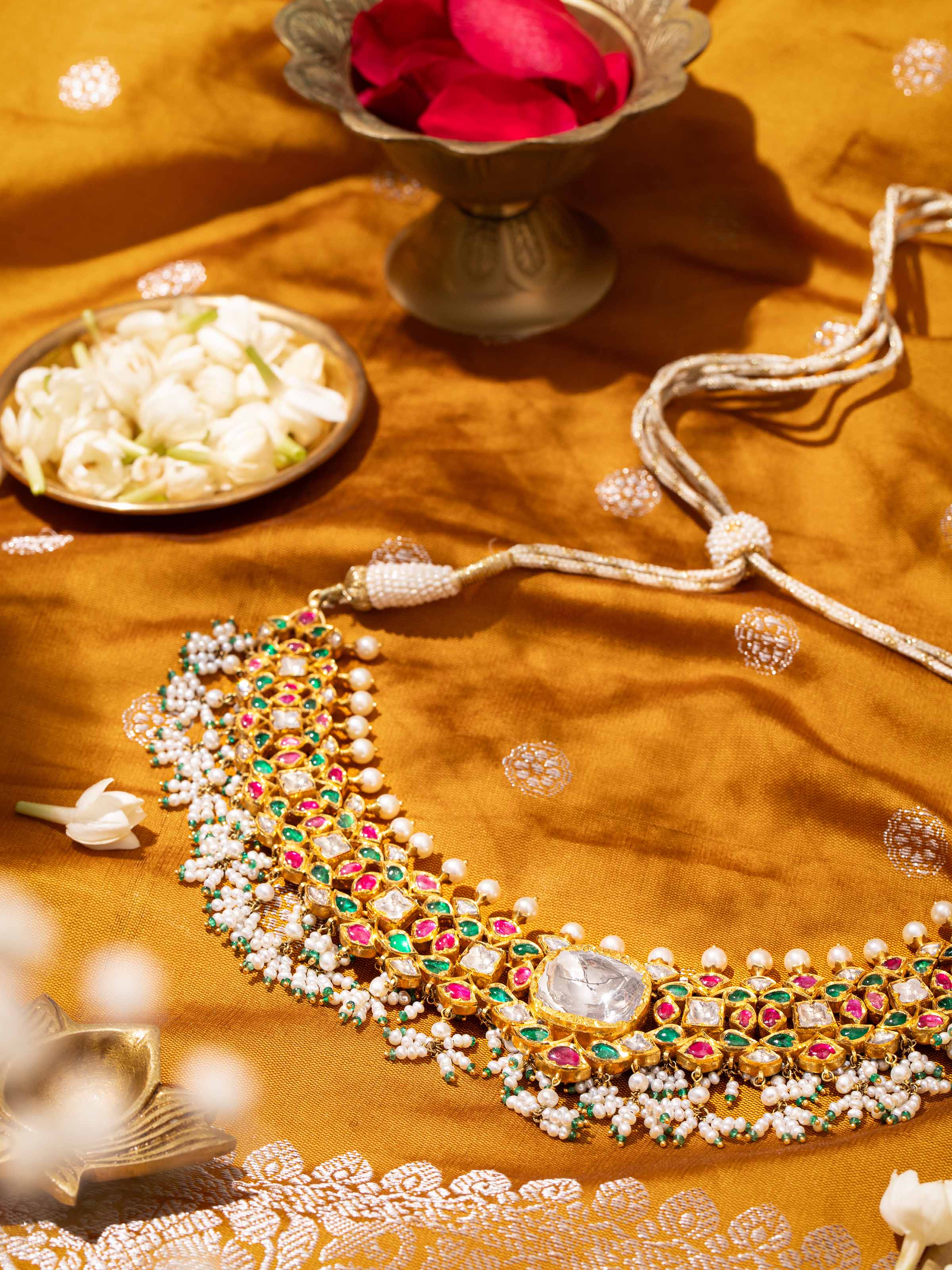 Close-up detail of Jadau gold collar necklace