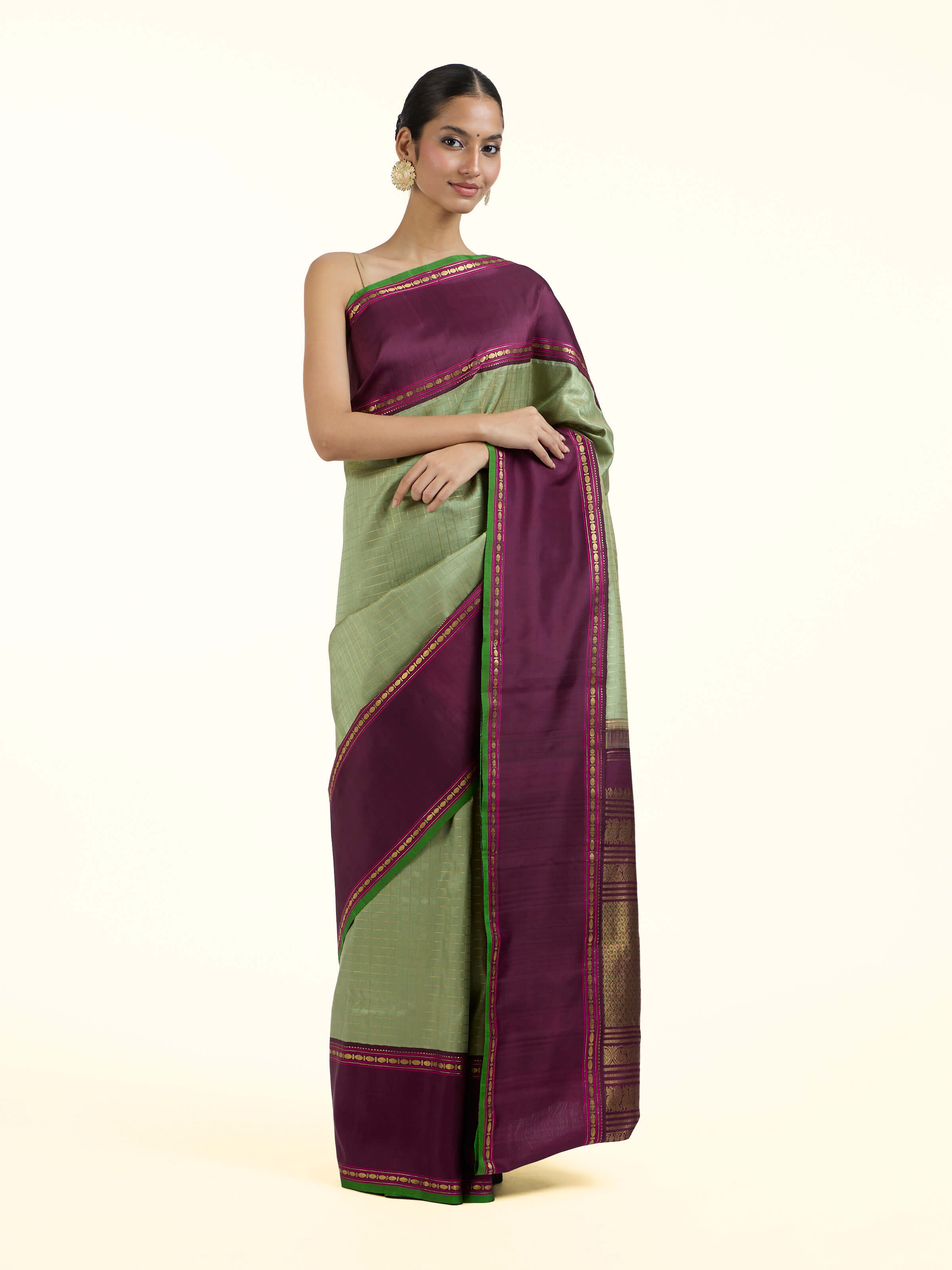 Front view of grey silk Kancheepuram saree with rich zari woven motifs