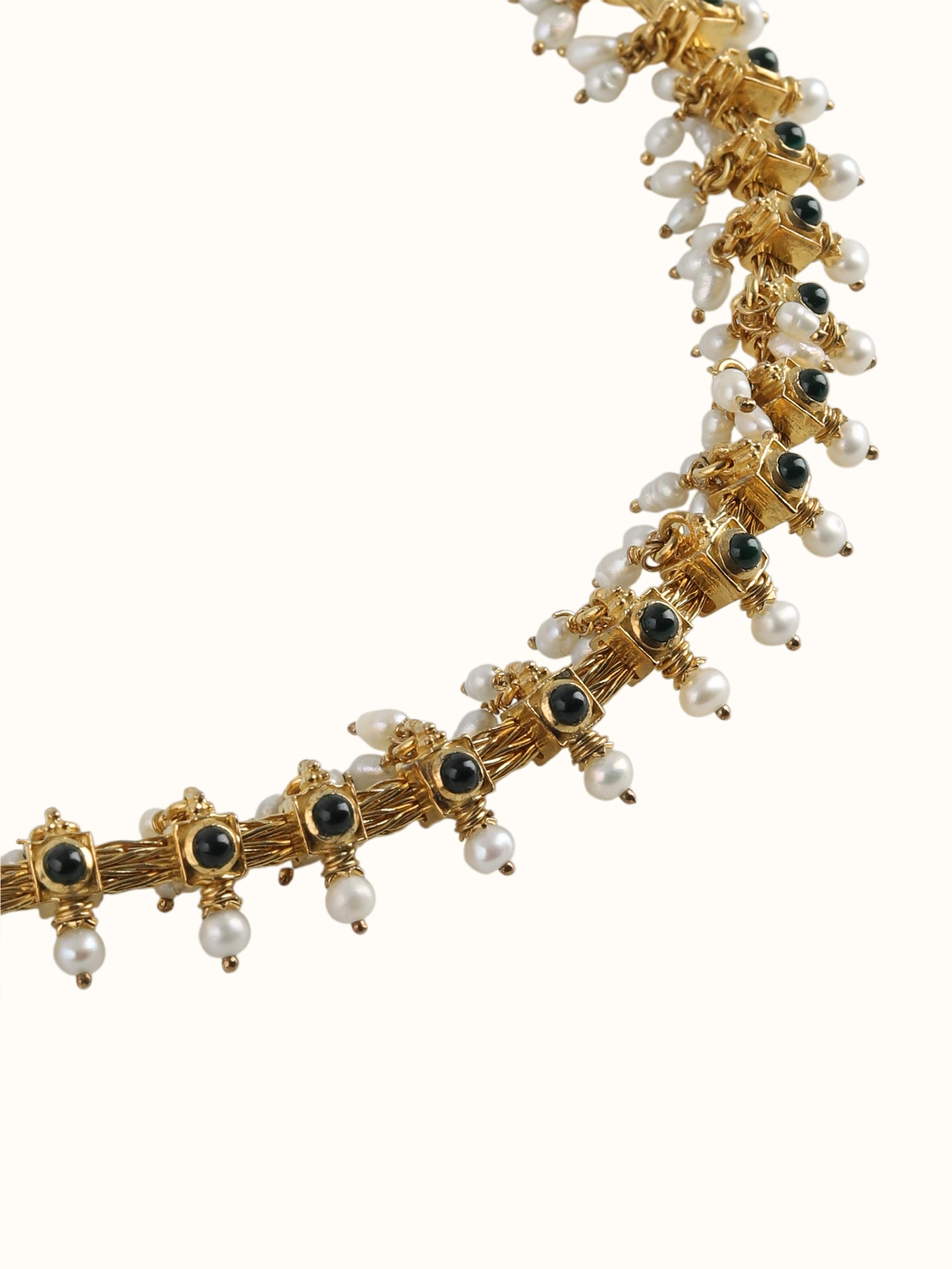 Angled view capturing the elegant drape and intricate embellishments