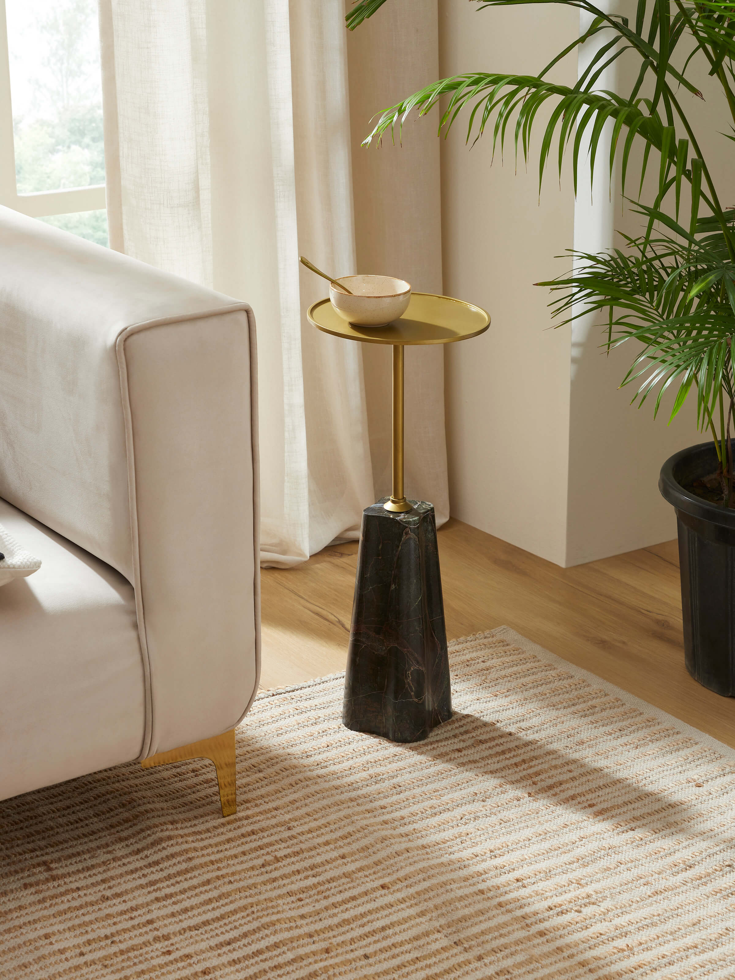 Lifestyle view of Marble Stone Carving Brass Finish End & Side Table