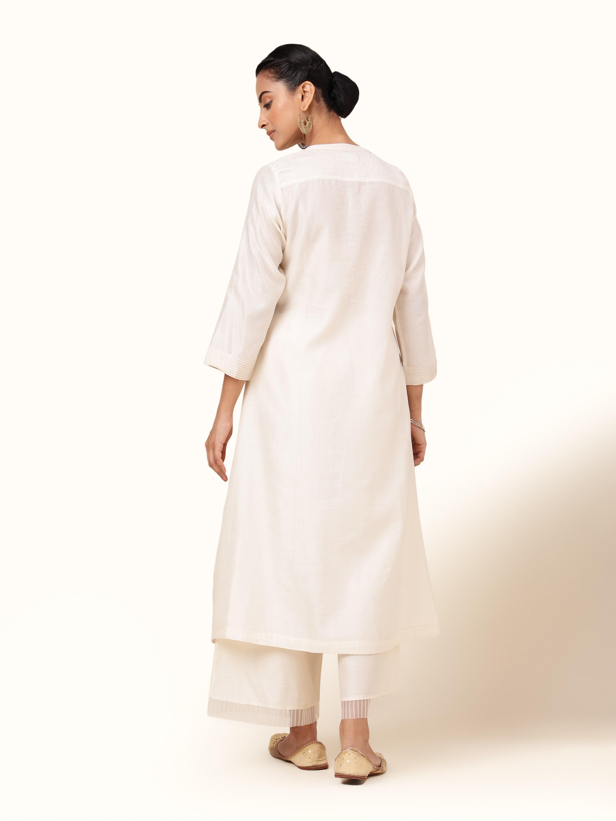 Back view of off-white cotton silk kurta showing clean tailoring and subtle sheen.