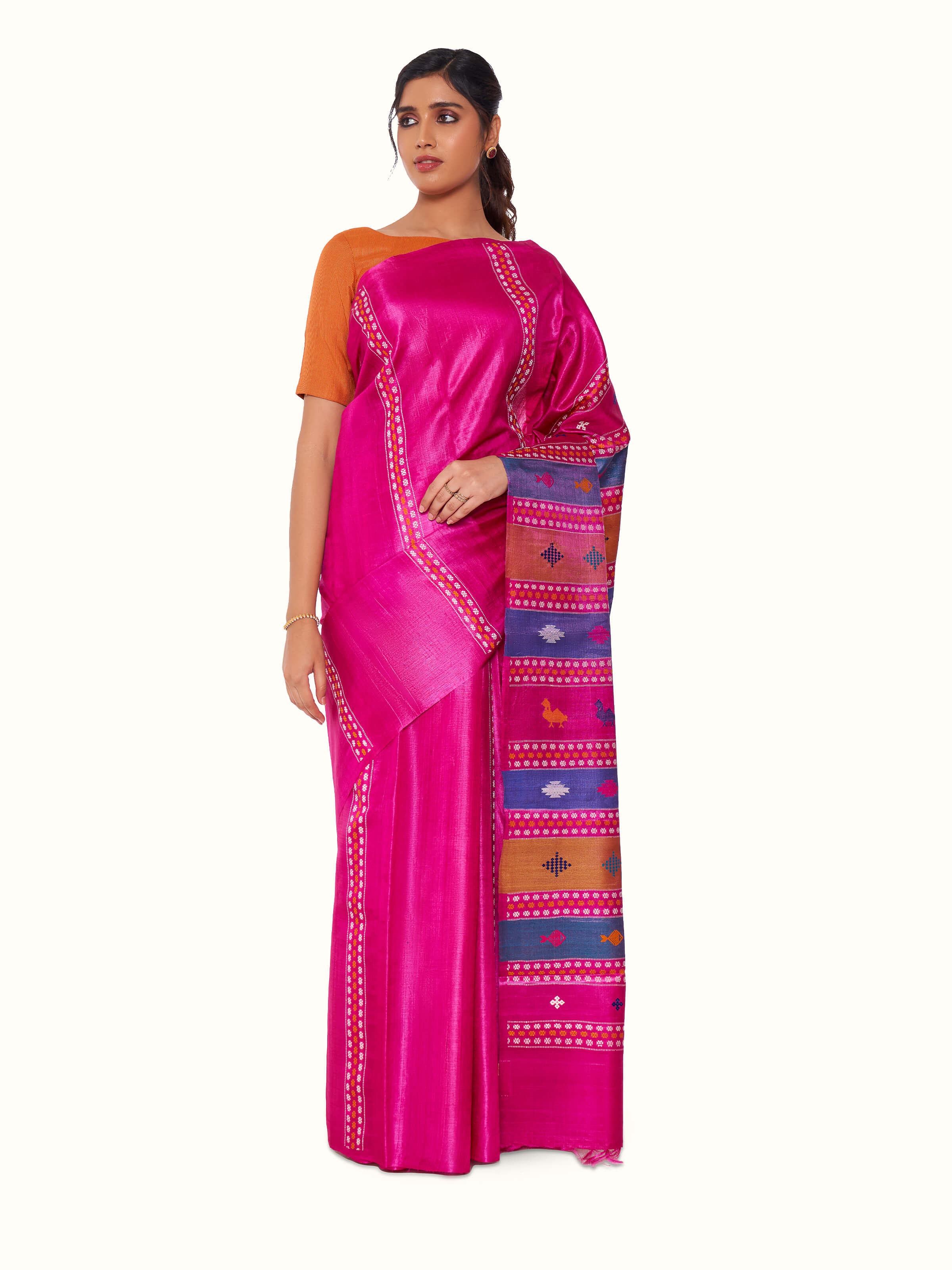 Front view of pink tussar silk saree with subtle natural texture