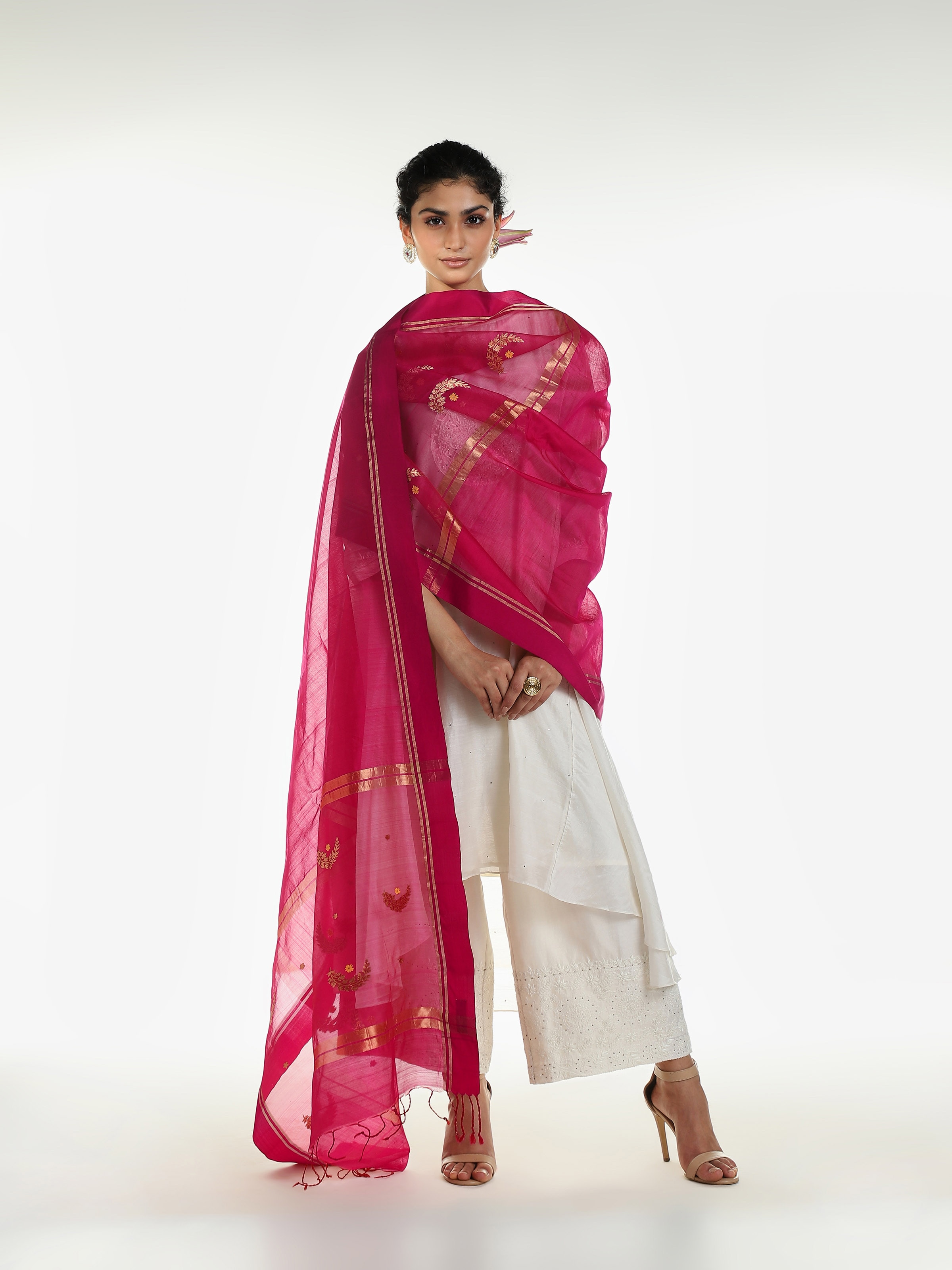 Side view of fuschia cotton silk Chanderi dupatta highlighting delicate weave