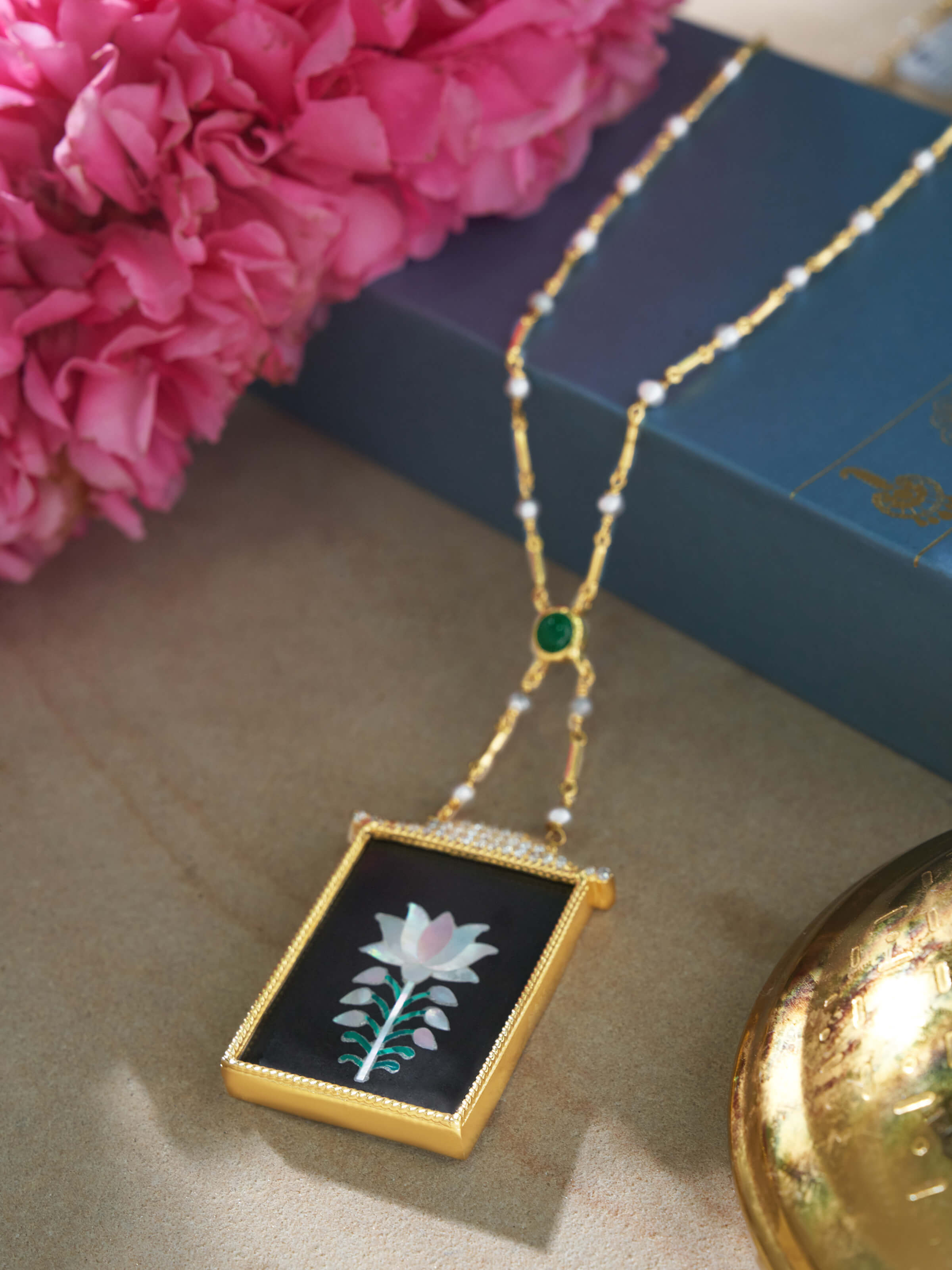 Overhead shot emphasizing pendant design and chain link style