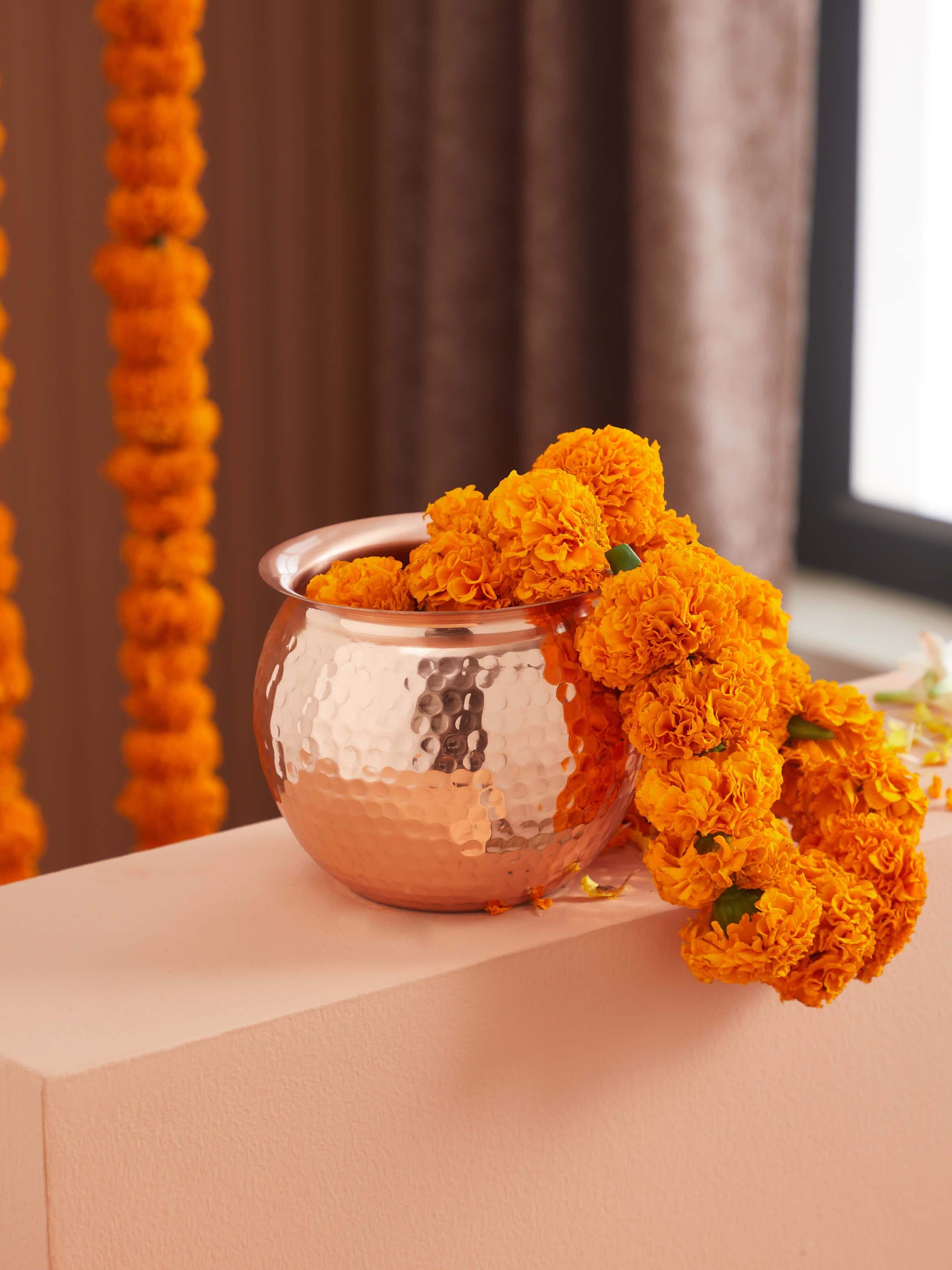 Side view of Polished copperware kalash