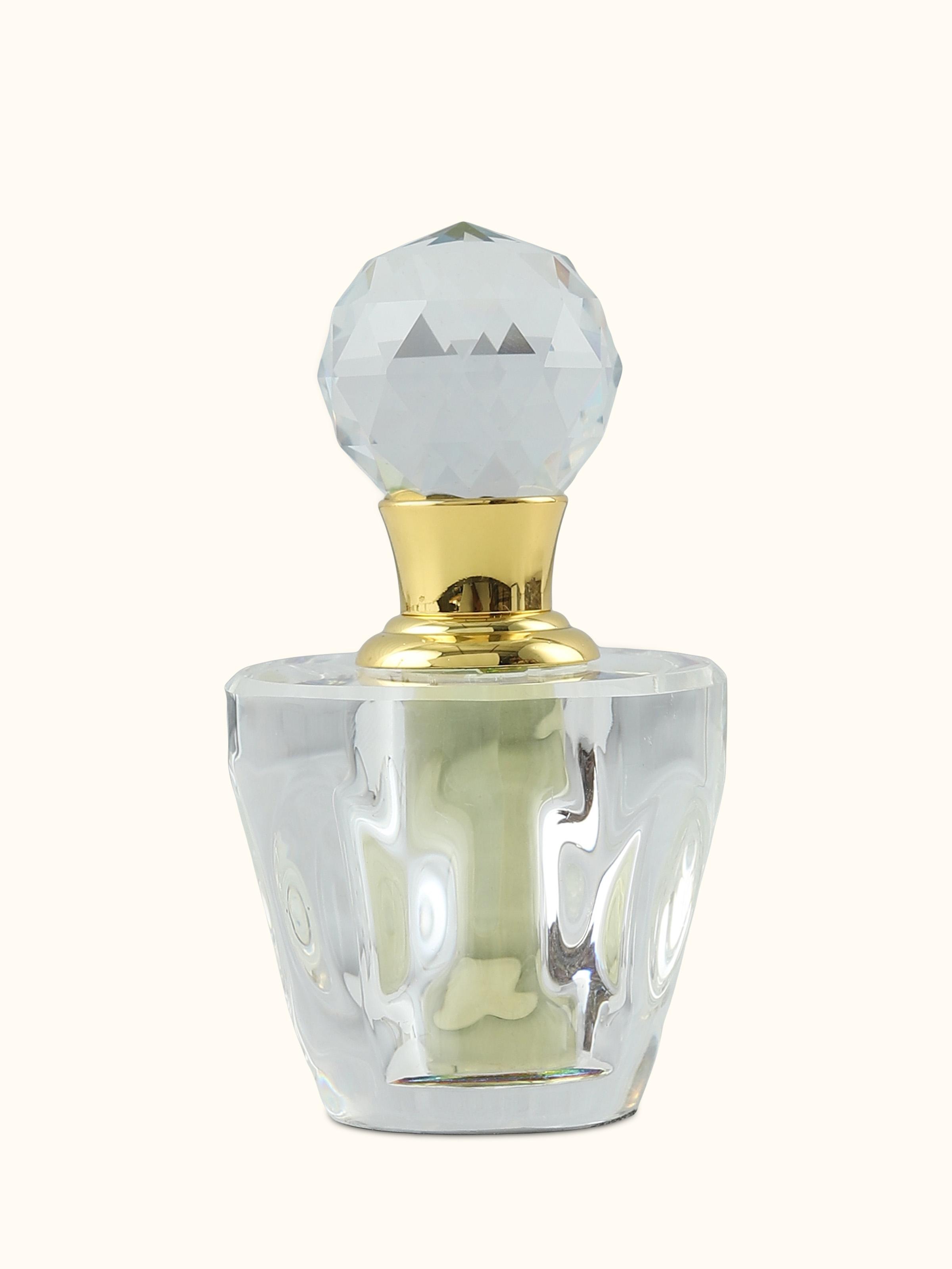 Front view of Attar Oudh Kashmiri bottle showcasing its rich golden hue and elegant glass packaging