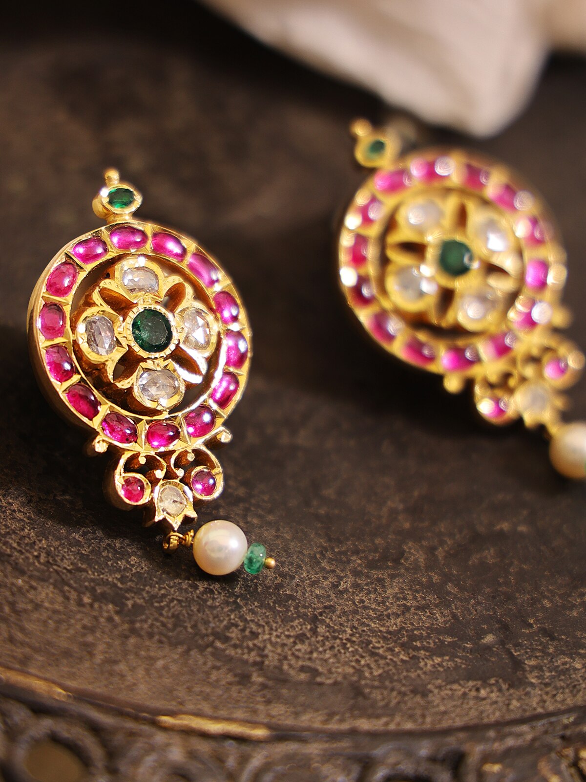 Detailed view of Kundala Velai 22 Karat Gold Drop Earrings highlighting intricate gold work and luxurious finish.