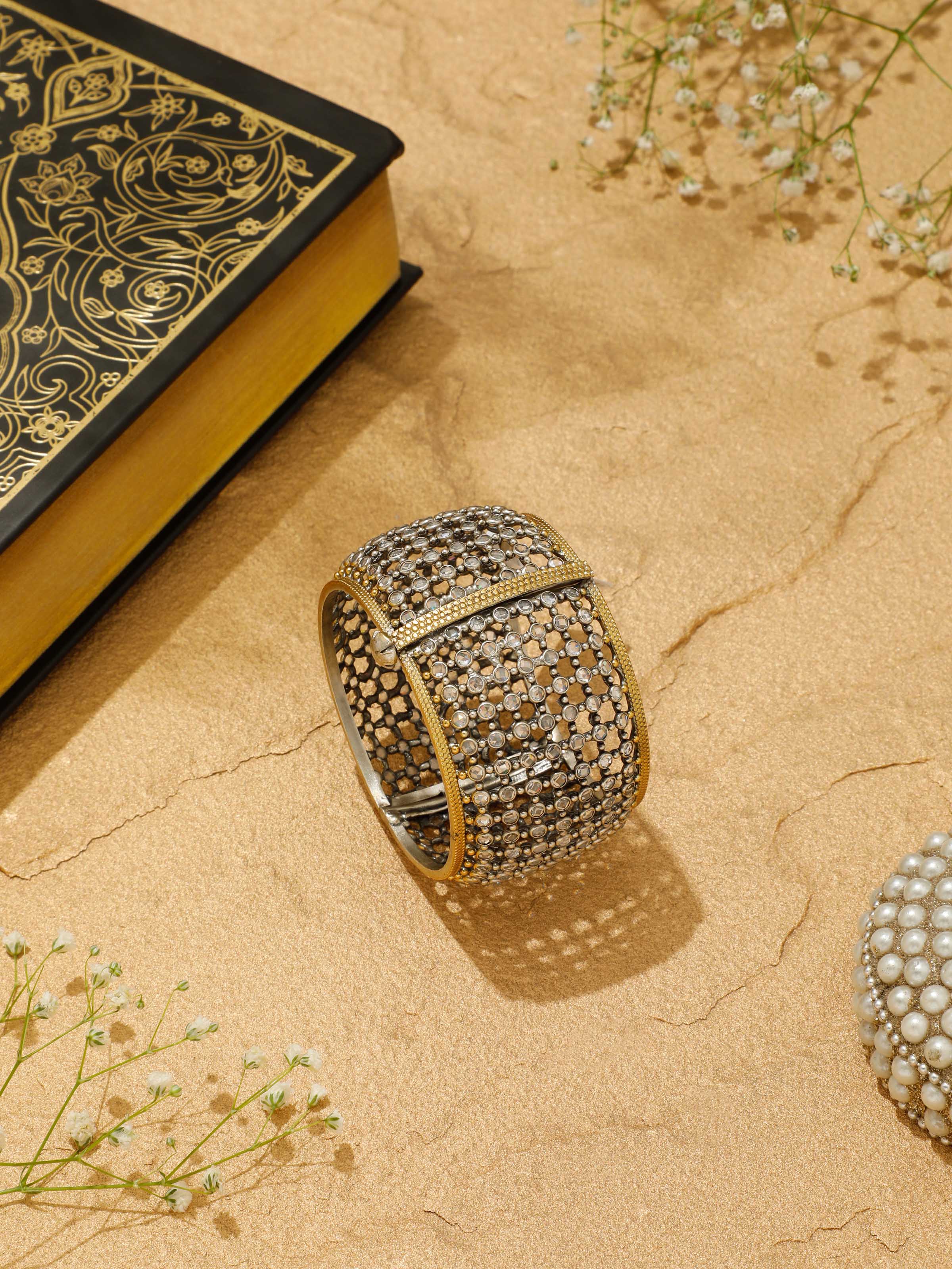 Top view of Silver Smithing open cuff bangle showing hammered texture and smooth edges.