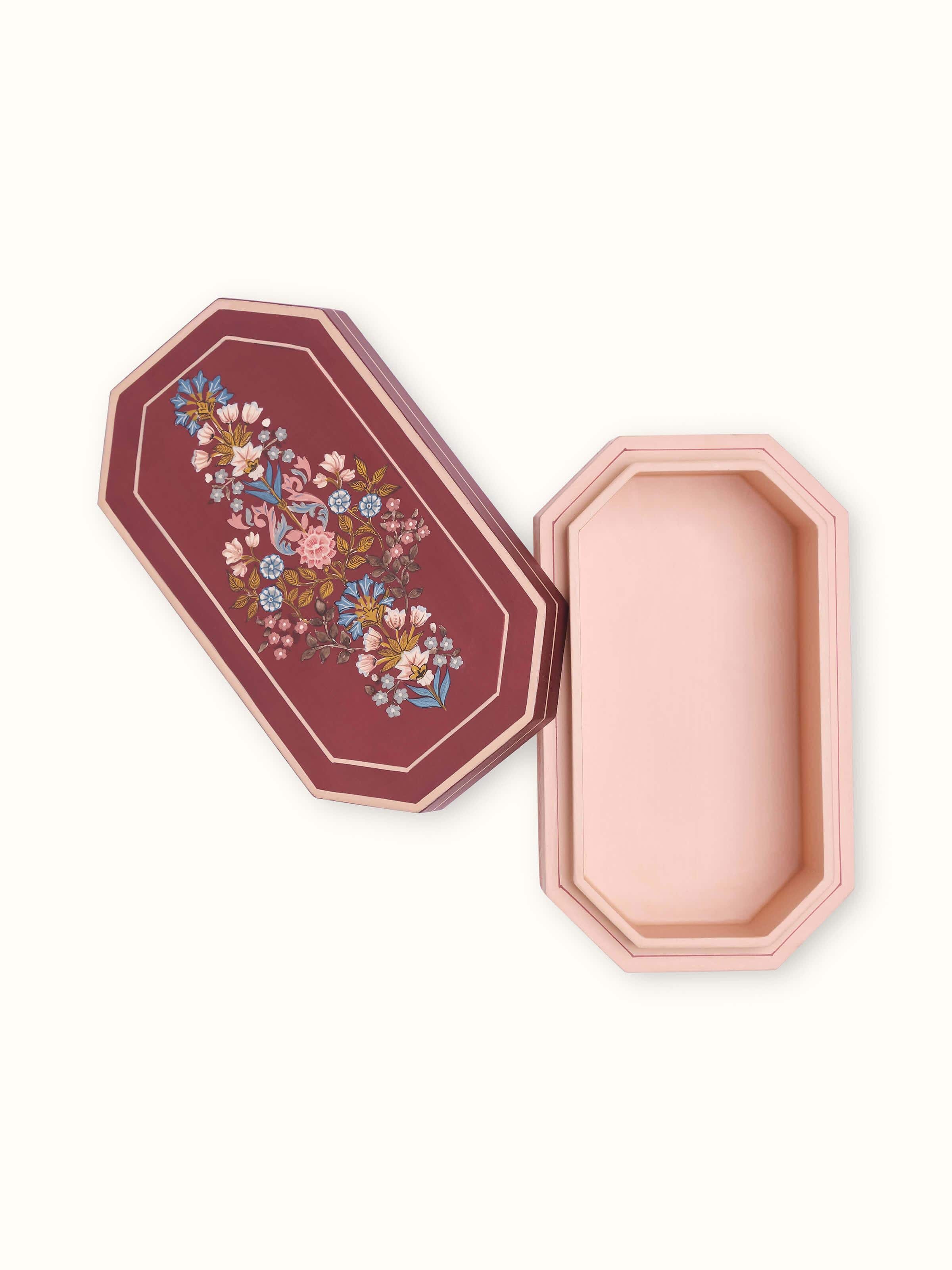 Detailed view of the marquetry paper-mache container, showcasing the artistry and texture of the wood and papier-mache.