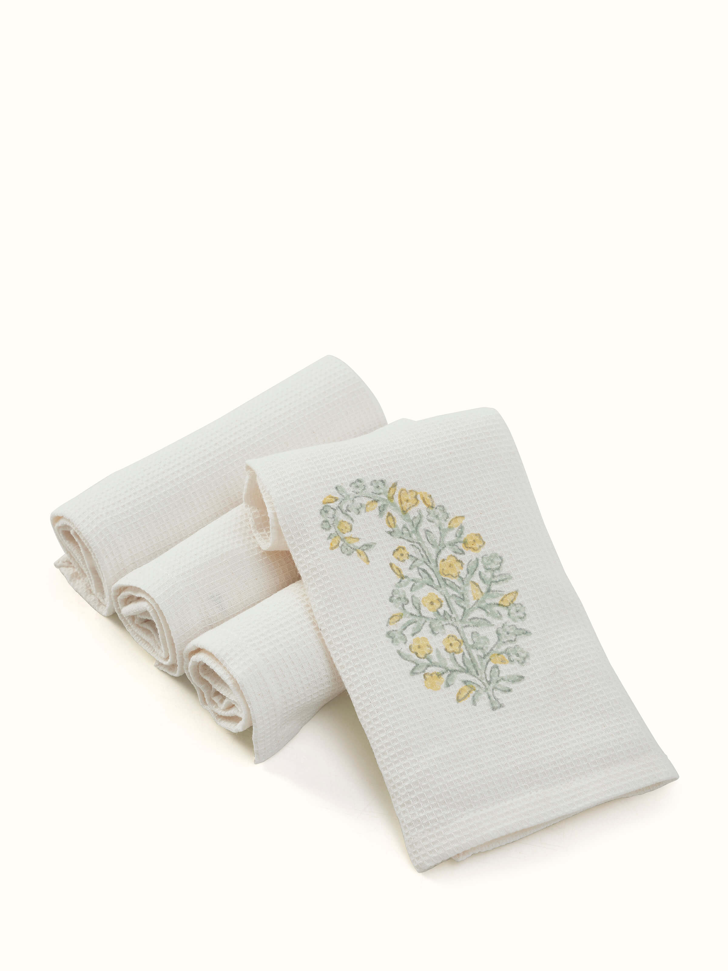Full view of Ambi Buta Yellow Floral Cotton Sanganeri Block Printed Face Towels displaying all four towels in a stack.