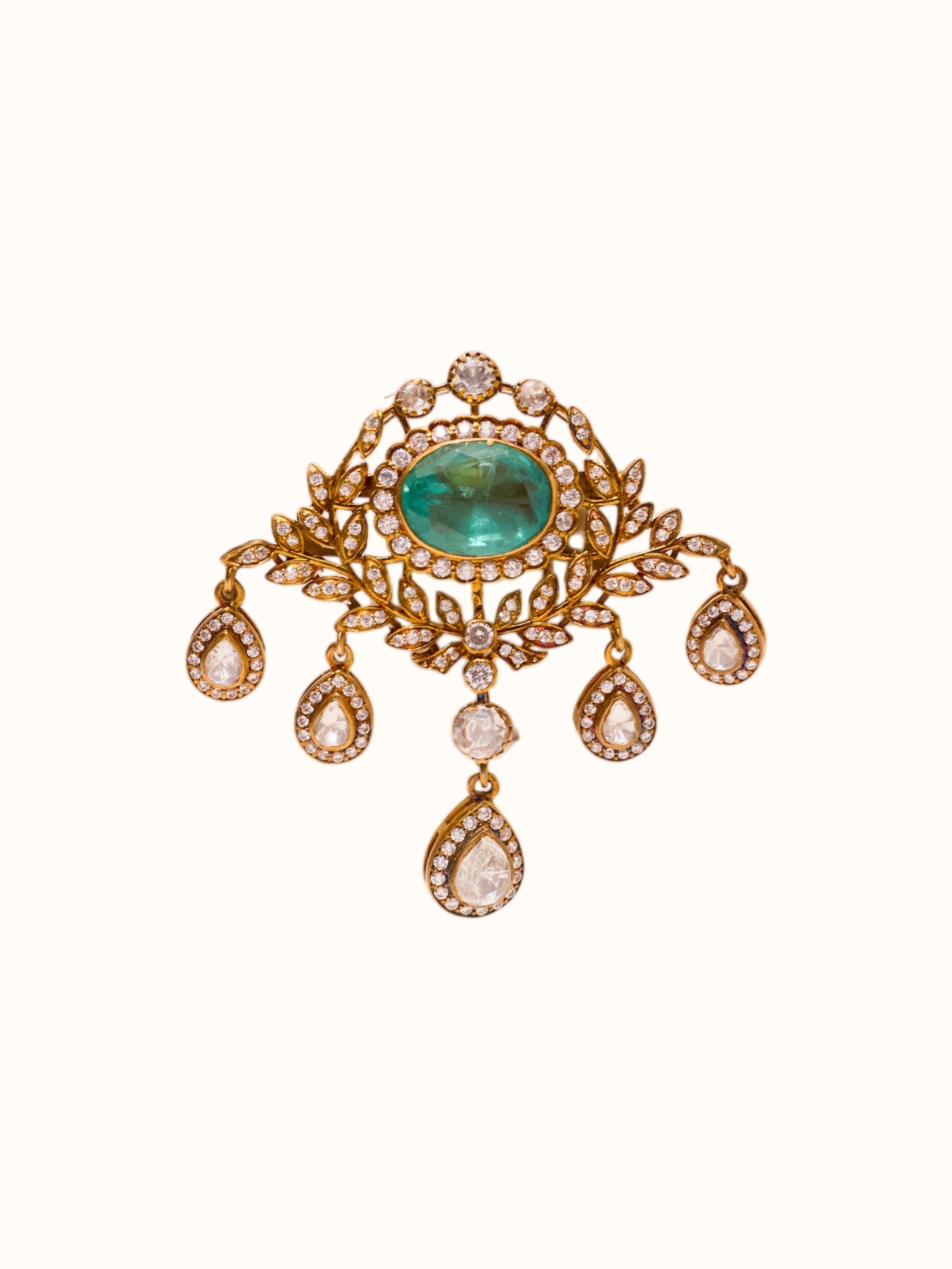 front view of silver smithing brooch pin with intricate design