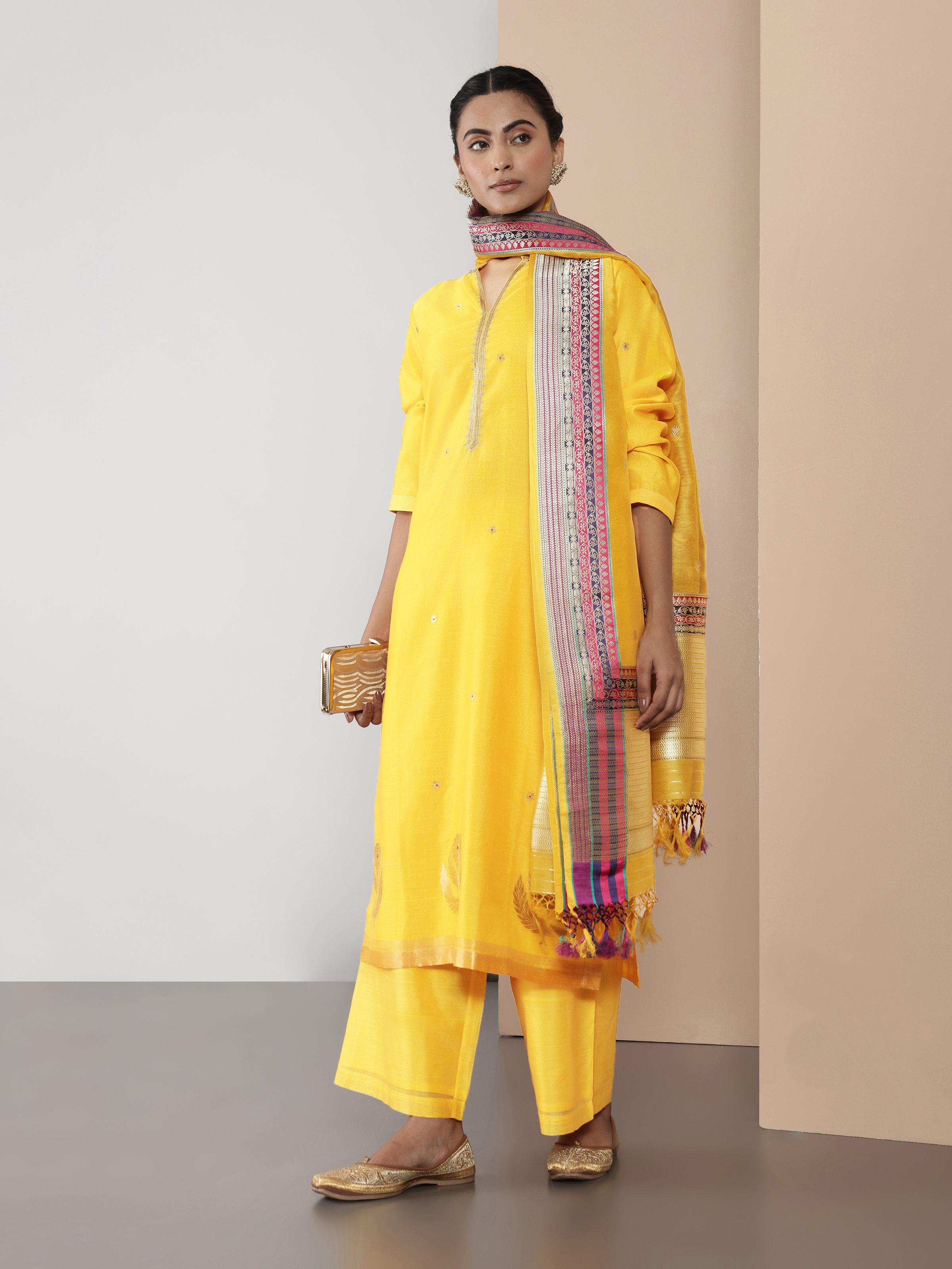 Side view showing pleats and soft sheen of fabric.