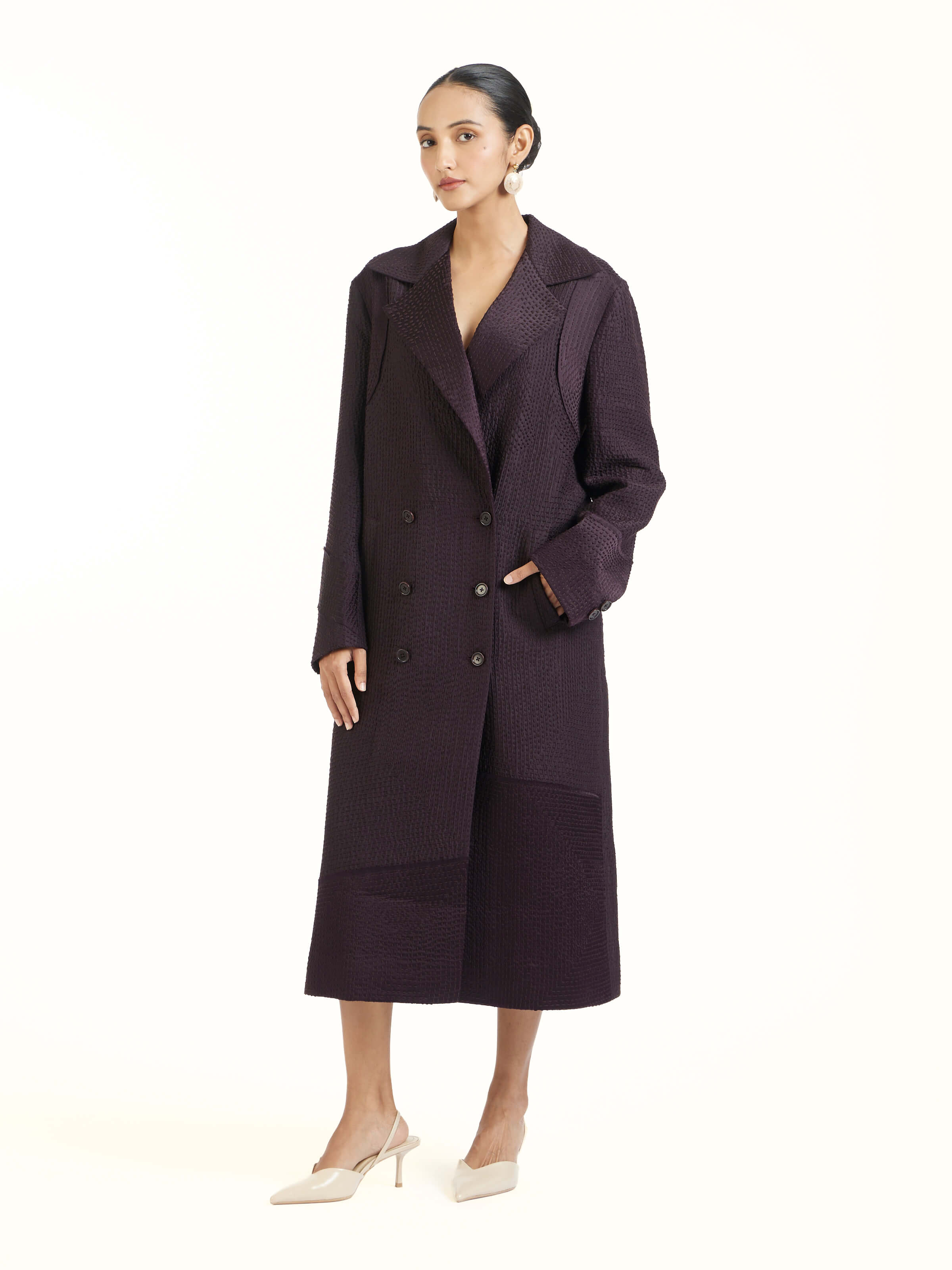 Side view of purple silk kantha trench coat with tailored silhouette