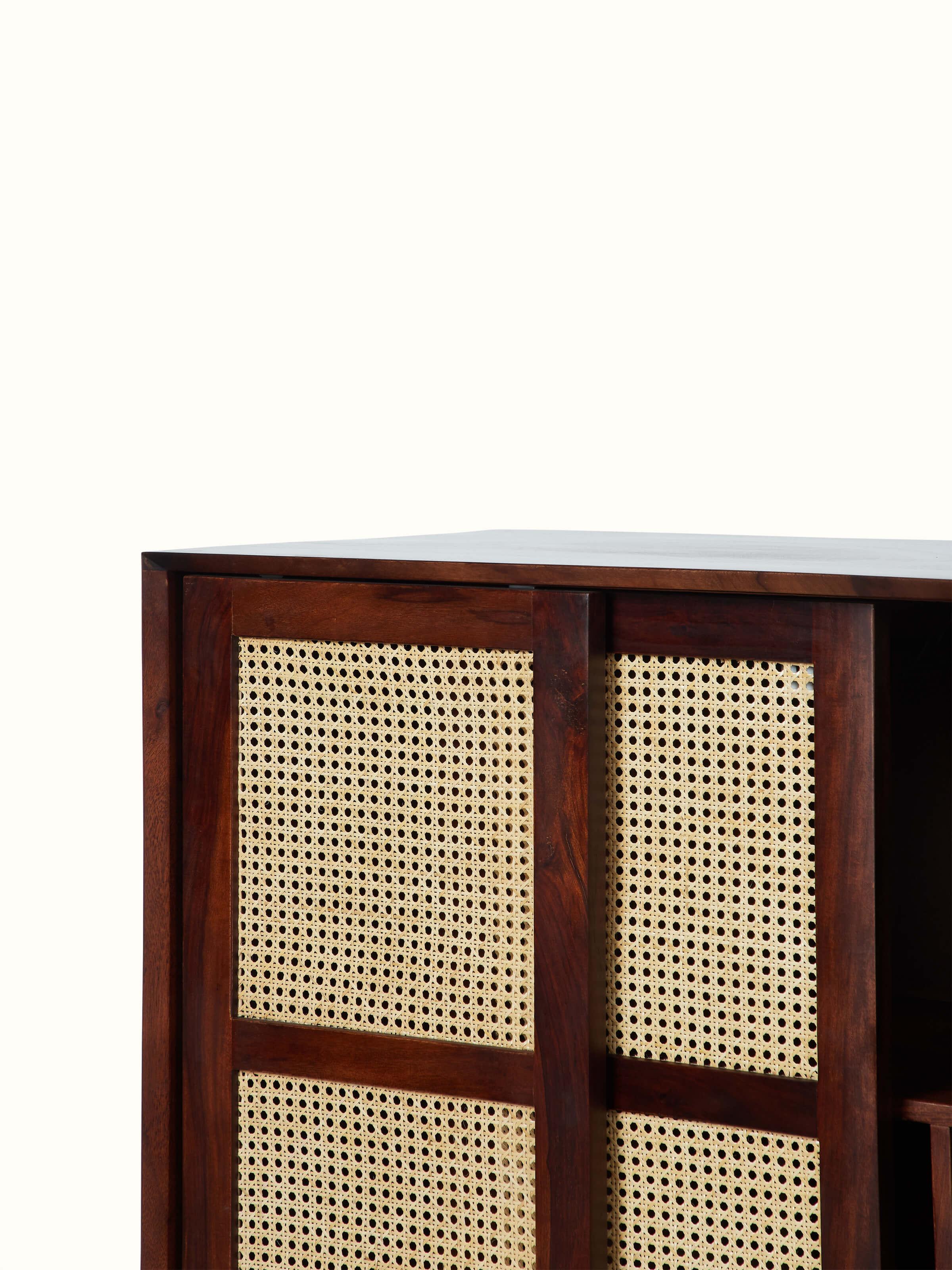 Close-up of the Sheesham wood detailing on the bar cabinet, highlighting the craftsmanship and finish.
