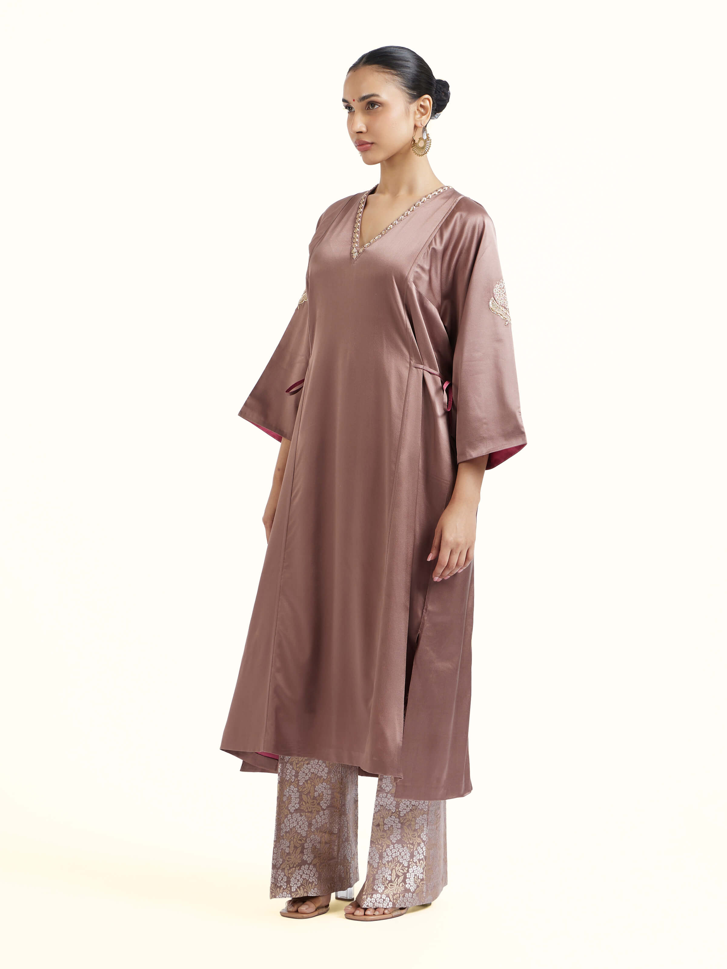 Side view of brown silk Banarasi co-ord set emphasizing elegant drape and traditional motifs