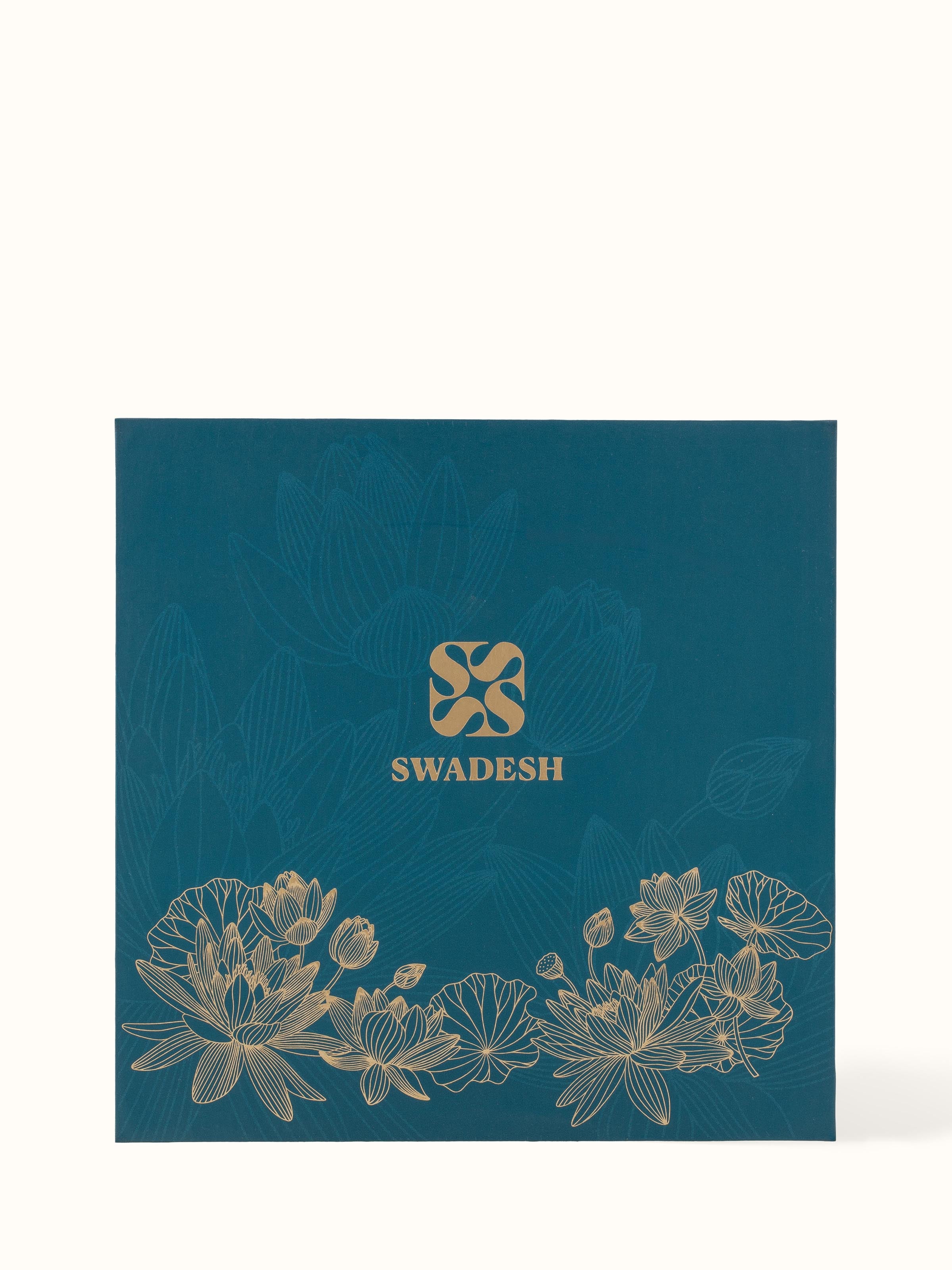 Back view of medium brass candle showing the base and candle care instructions