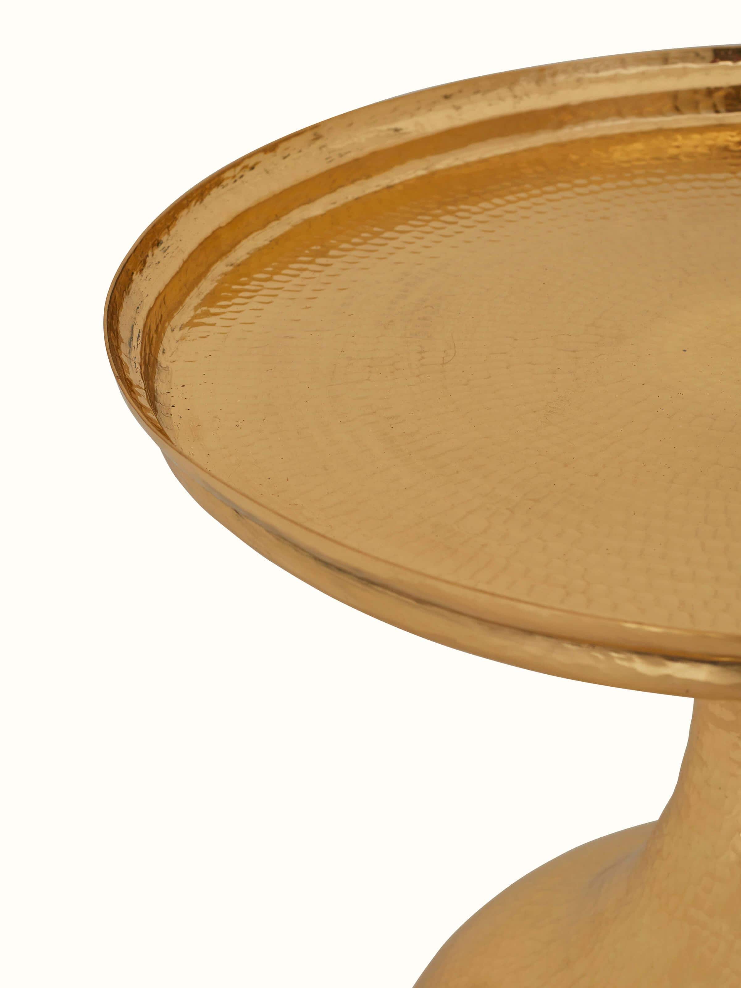 Detailed view of the Brass Thathera end and side table, showing its elegant finish and texture.