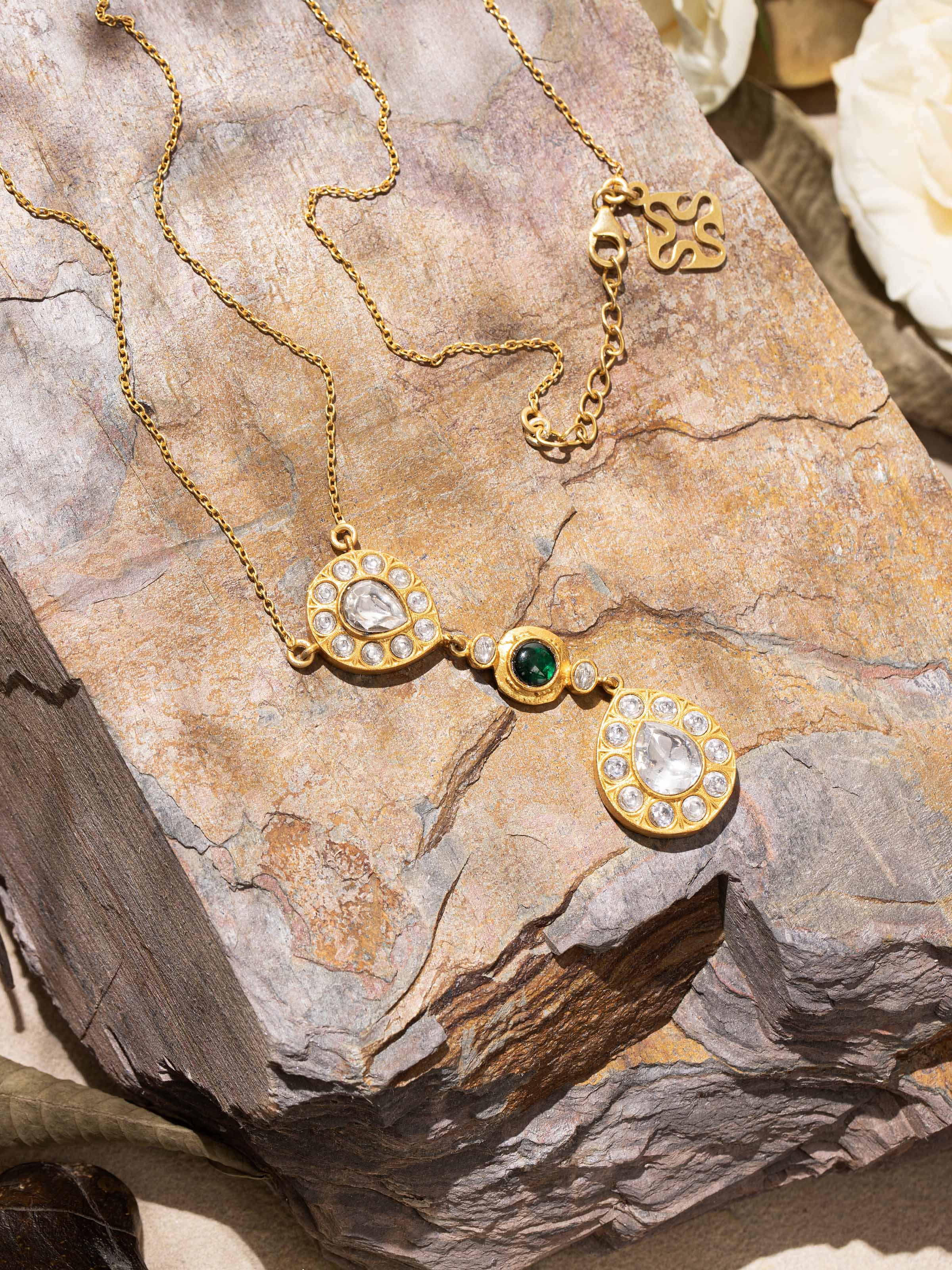 Alternate side view capturing the sleek chain and crafted pendant structure