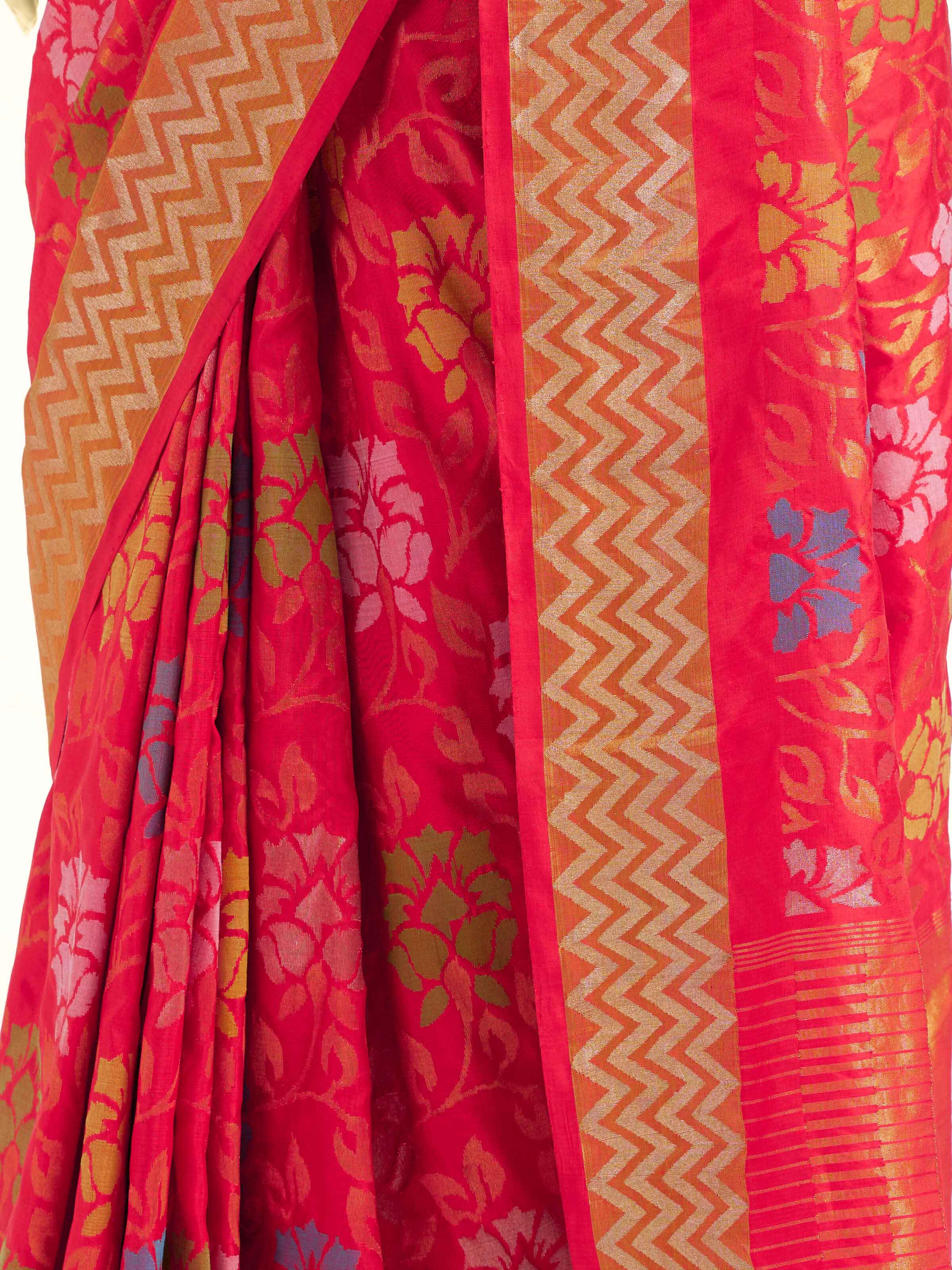 Detail view of red mulberry silk Uppada Jamdani saree showing intricate weave