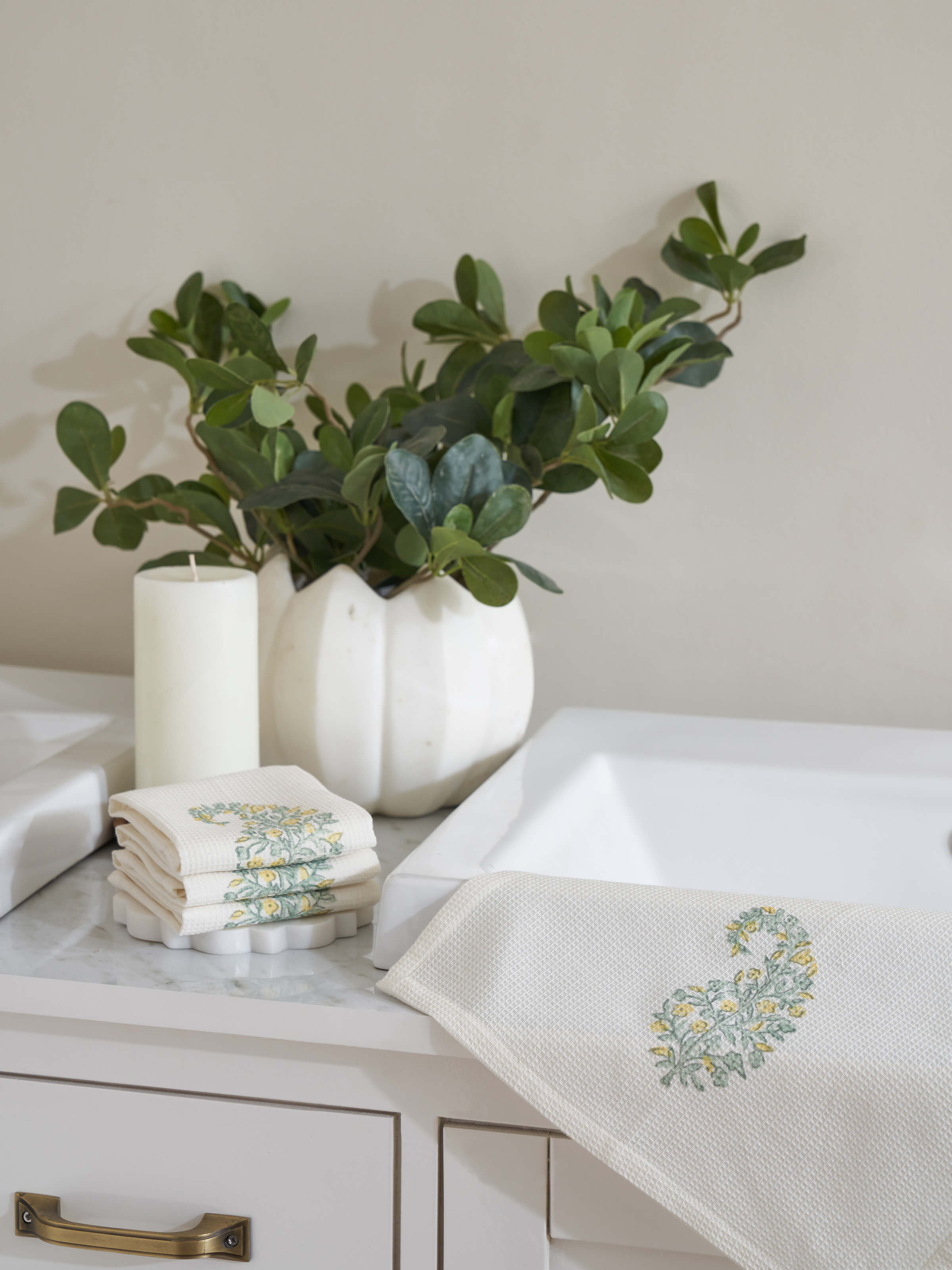 Side view of Ambi Buta Yellow Floral Cotton Sanganeri Block Printed Face Towels showing the texture and print details.