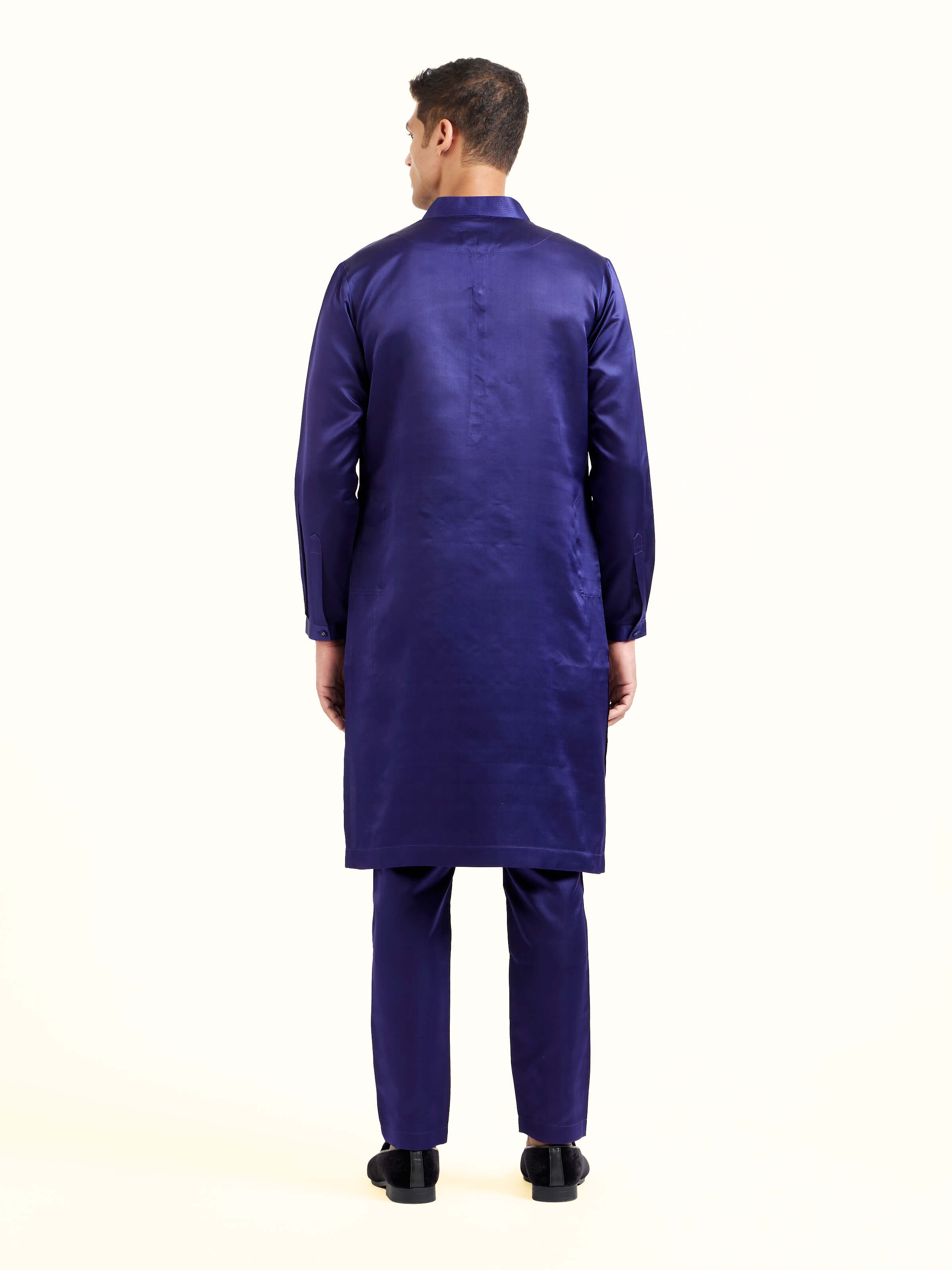 Back view of navy blue katan silk Banarasi midi kurta pant set showing full design